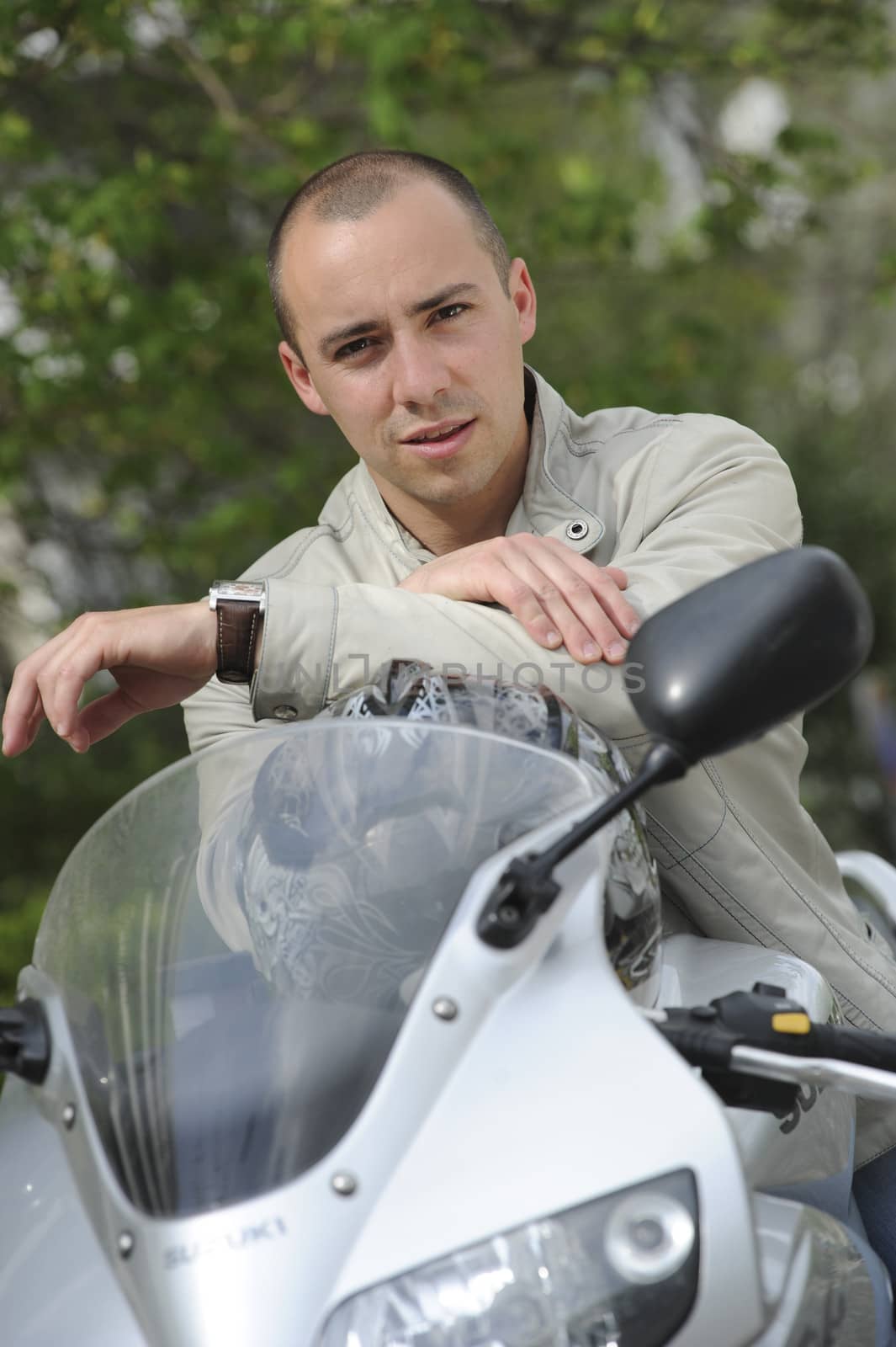 Young man with motorcycle