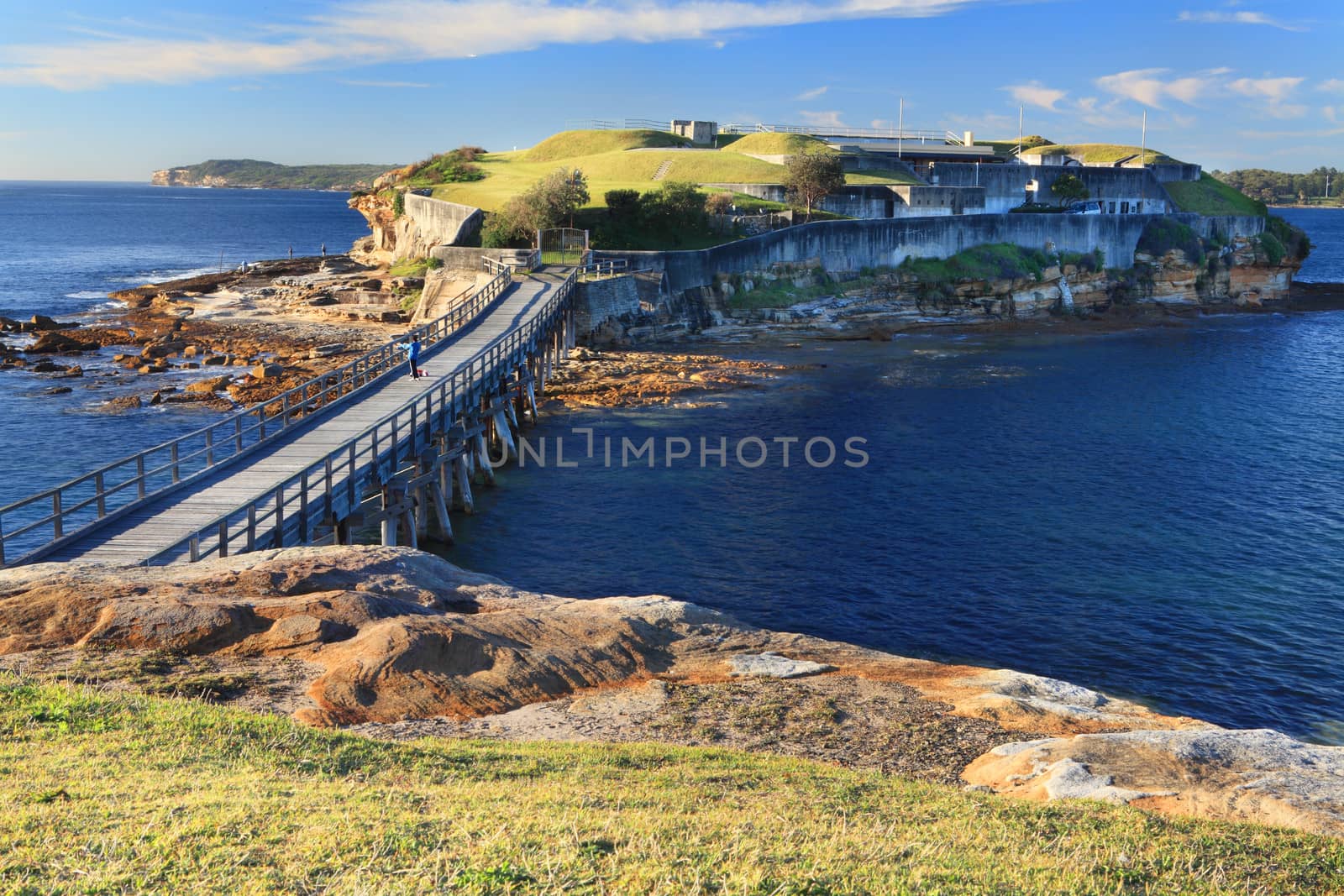 The Pier bridge to Bare Island Botany Bay, Sydney Australia.  A popular spot for divers and fisherman due to the diverse marine life and underwater caves and caverns and reefs.