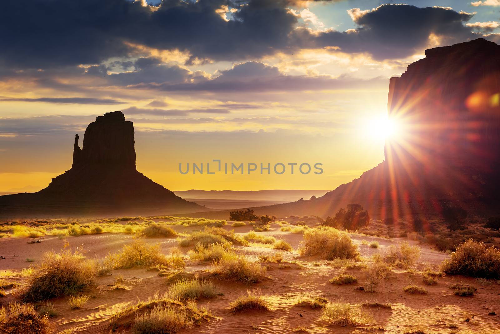 Sunset at the sisters in Monument Valley, USA