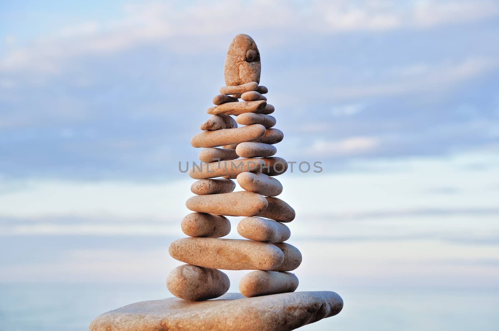 Pyramidal stack of pebbles on the seacoast