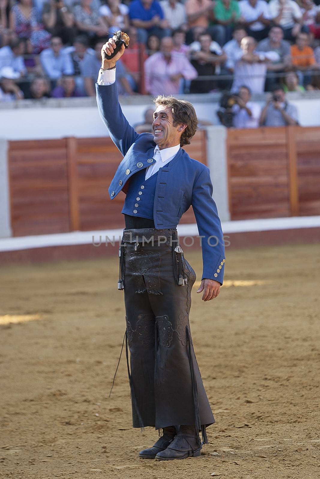 Pozoblanco, Cordoba province, SPAIN - 25 september 2011: Spanish bullfighter on horseback Pablo Hermoso de Mendoza thank the trophy which has been awarded the President of bullring, an ear in his right hand in Pozoblanco, Cordoba province, Andalusia, Spain
