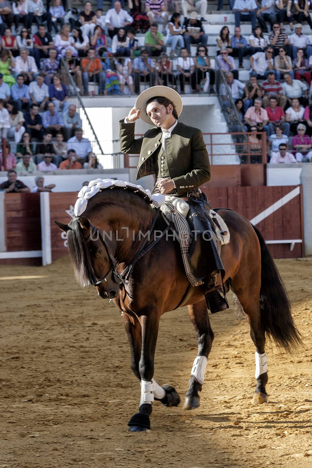 Pozoblanco, Cordoba province, SPAIN- 25 september 2011: Spanish bullfighter on horseback Diego Ventura bullfighting on horseback, removing its hat to offer to the public its performance, in Pozoblanco, Cordoba province, Andalusia, Spain