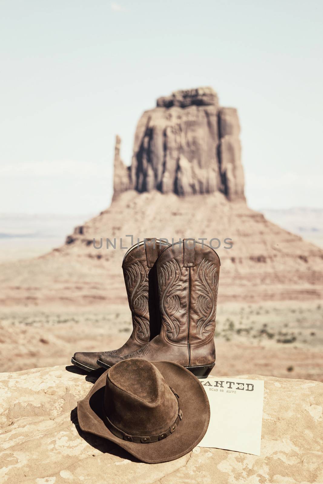 boots and hat at famous Monument Valley by vwalakte