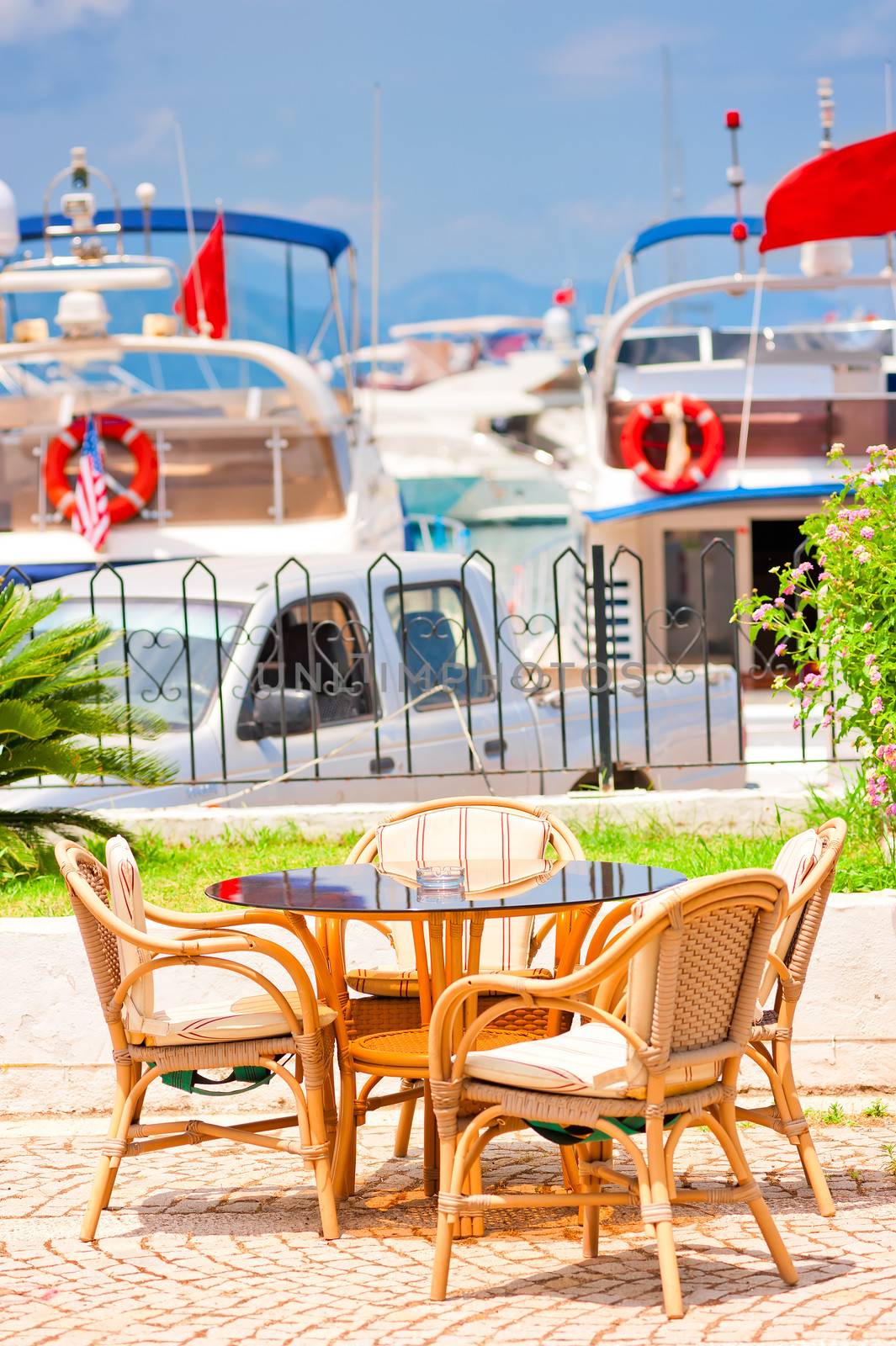 table against the background of the yacht harbor