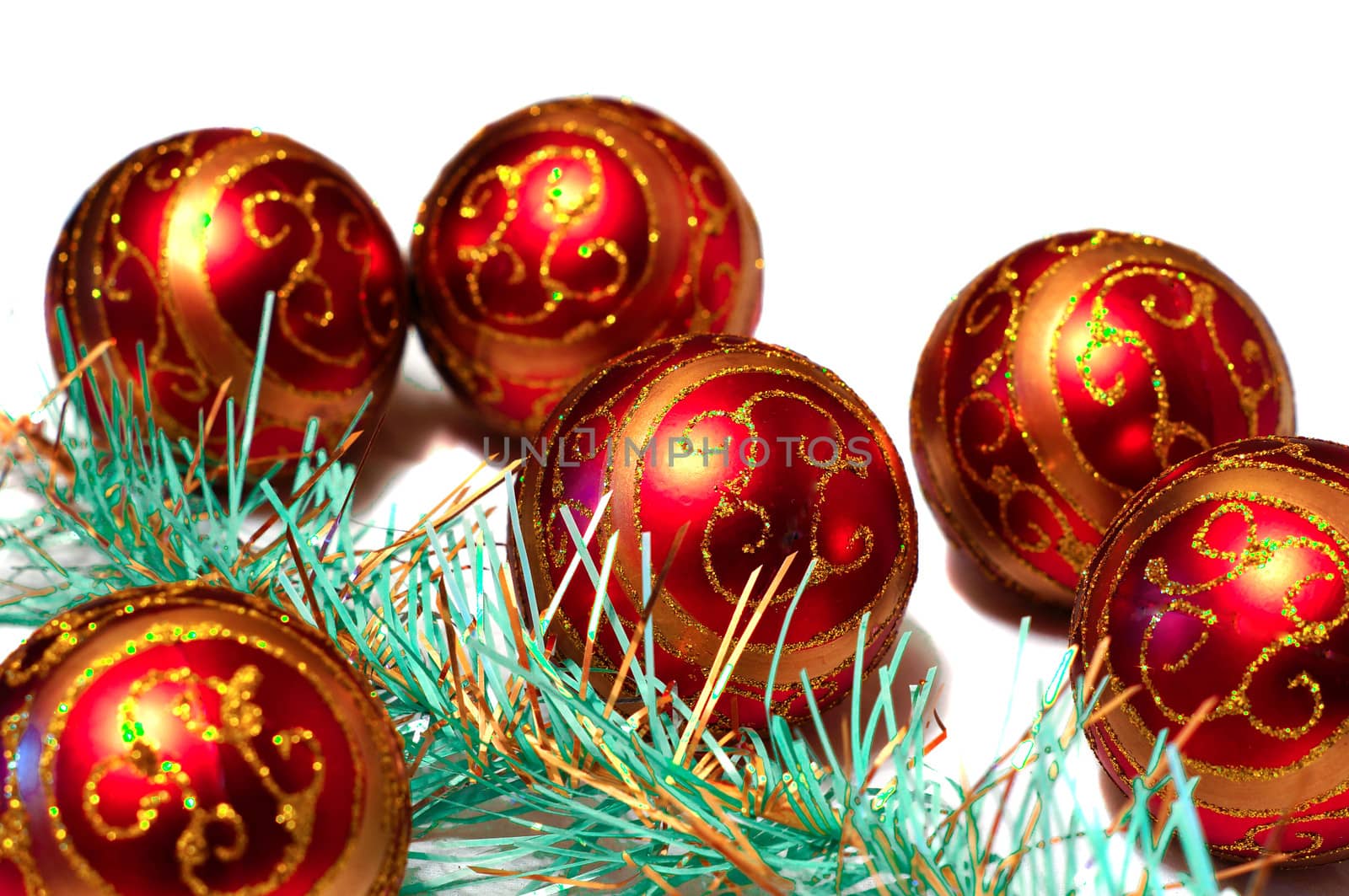 Composition of red Christmas balls with golden pattern