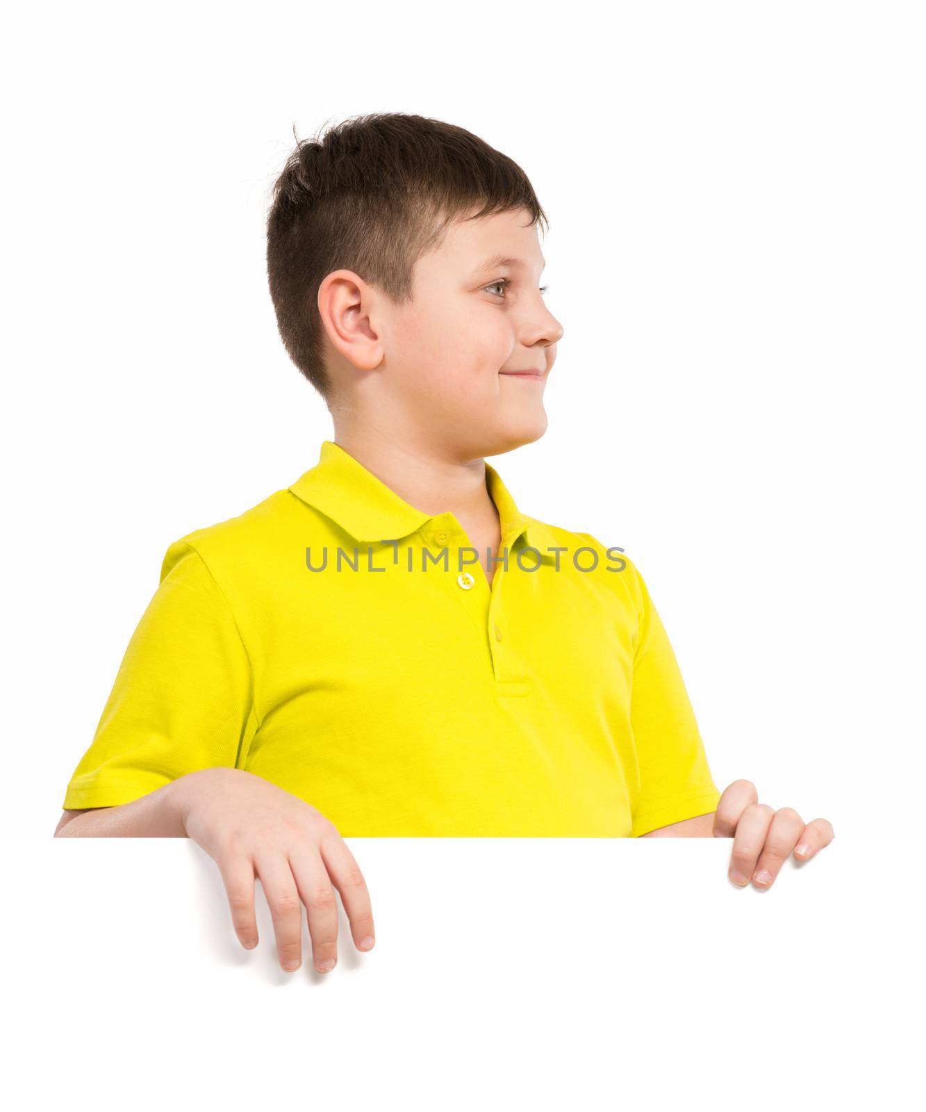 boy holding a white placard, place for text