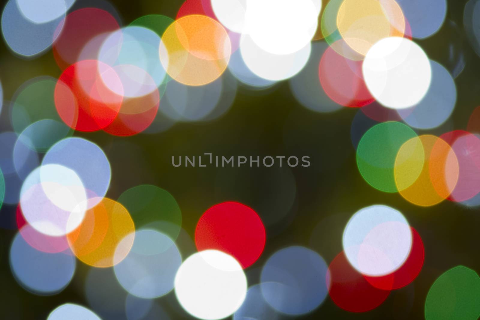 Multicolor Light Orb Background Horizontal Christmas Lights through a long lens 