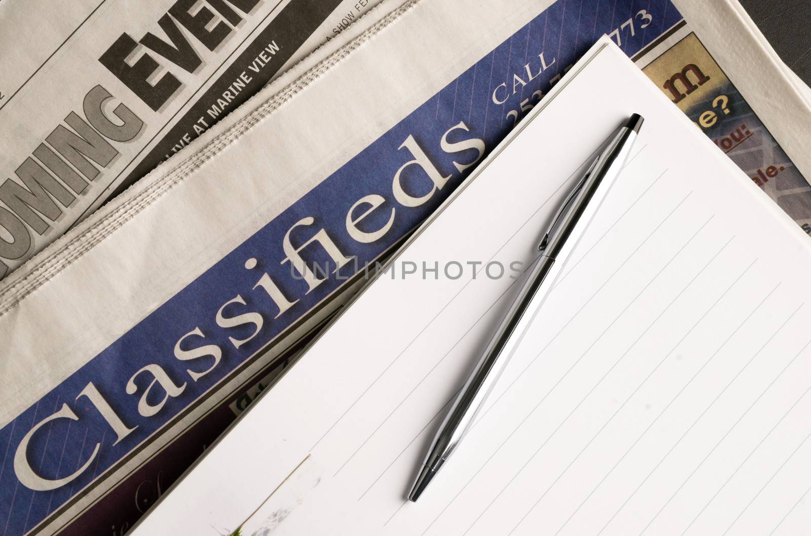 Newspapers Classified Saction Coming Events Notepad Pen