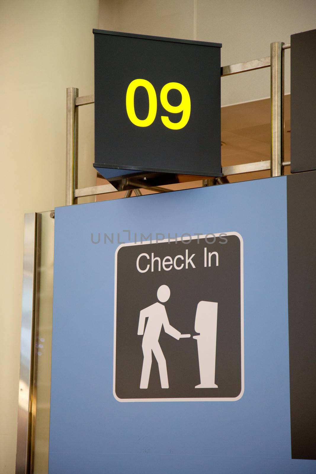 Airport departure board in terminal with flight information