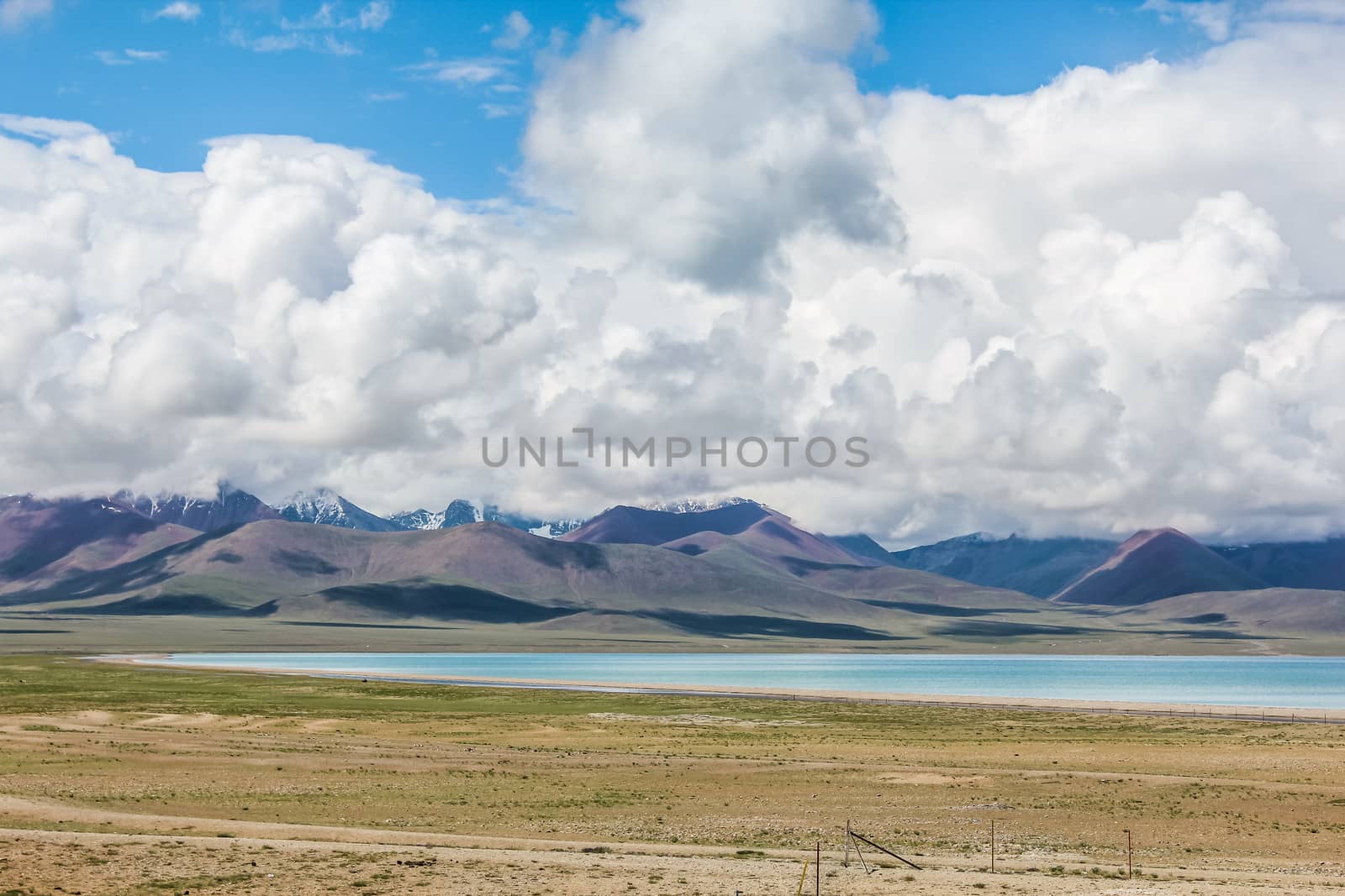 Landscape with lake cloud and mountains by IVYPHOTOS