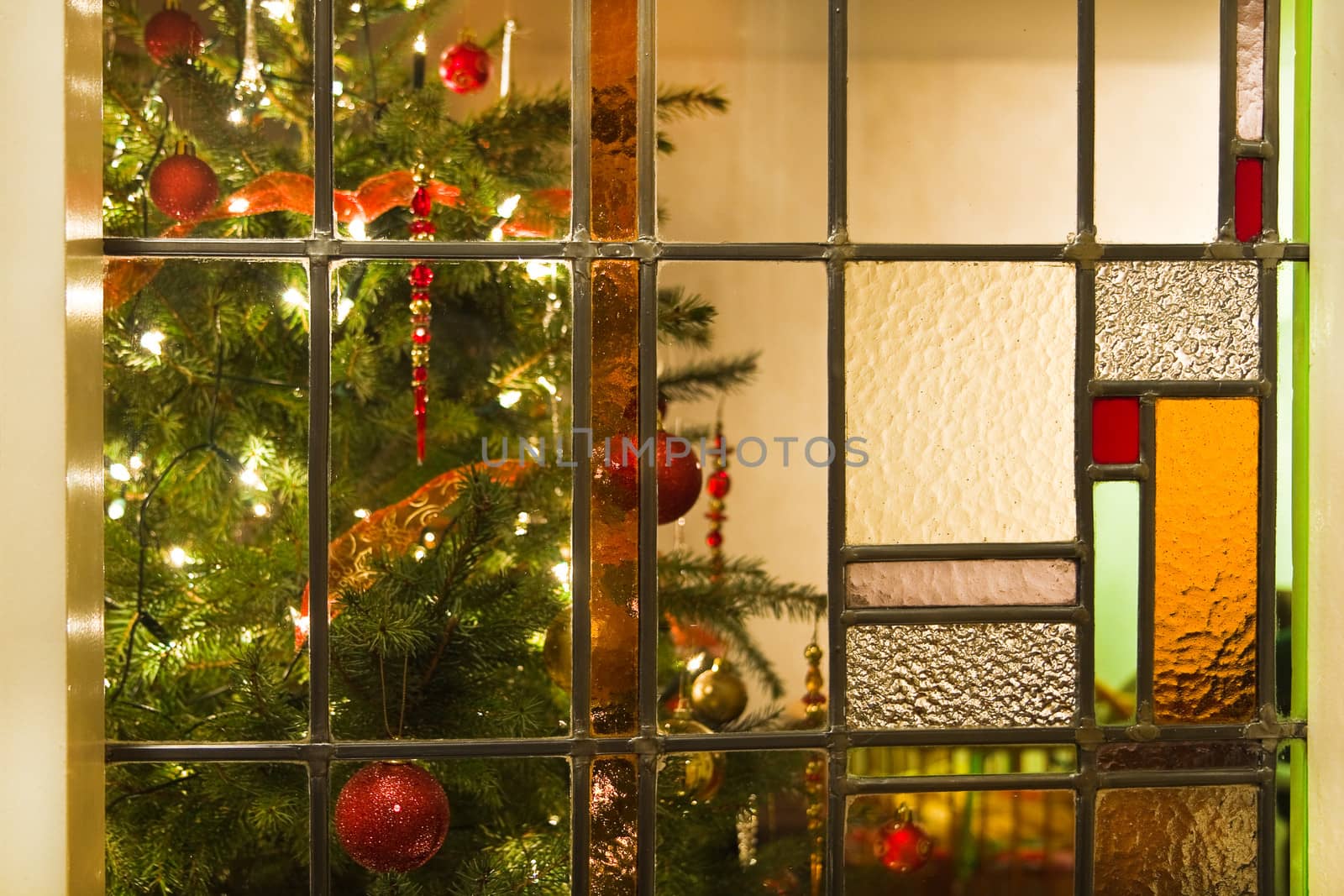 Interior with christmas tree and stained glass by Colette