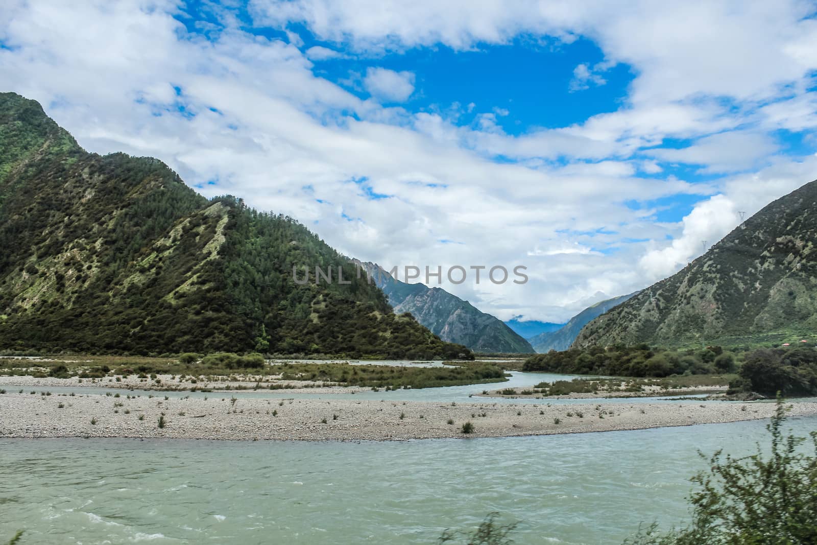 Landscape with lake cloud and mountains by IVYPHOTOS