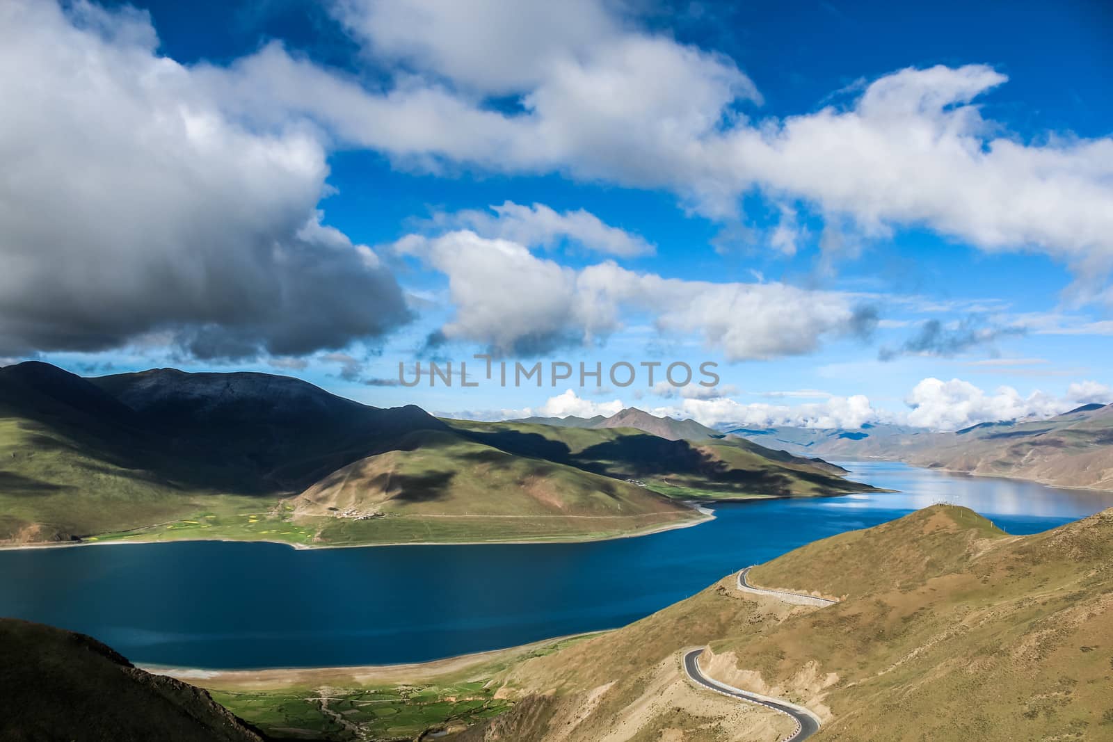 Landscape with lake cloud and mountains by IVYPHOTOS