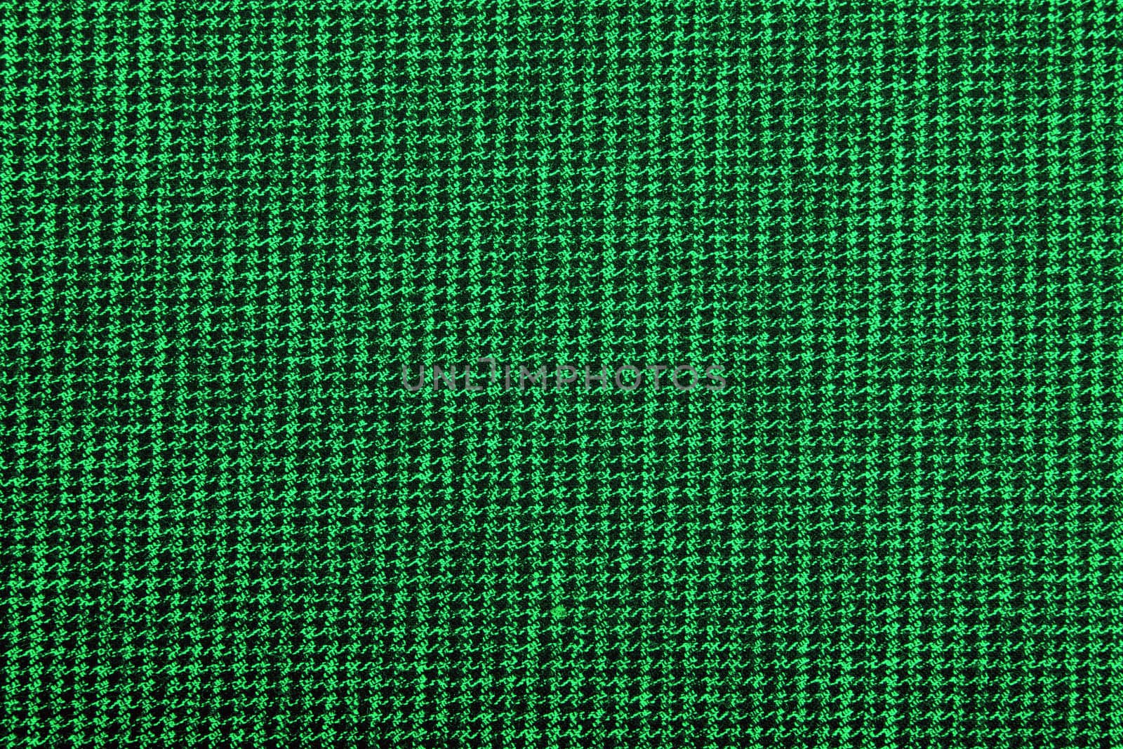 Material into small, green grid, a textile  background.