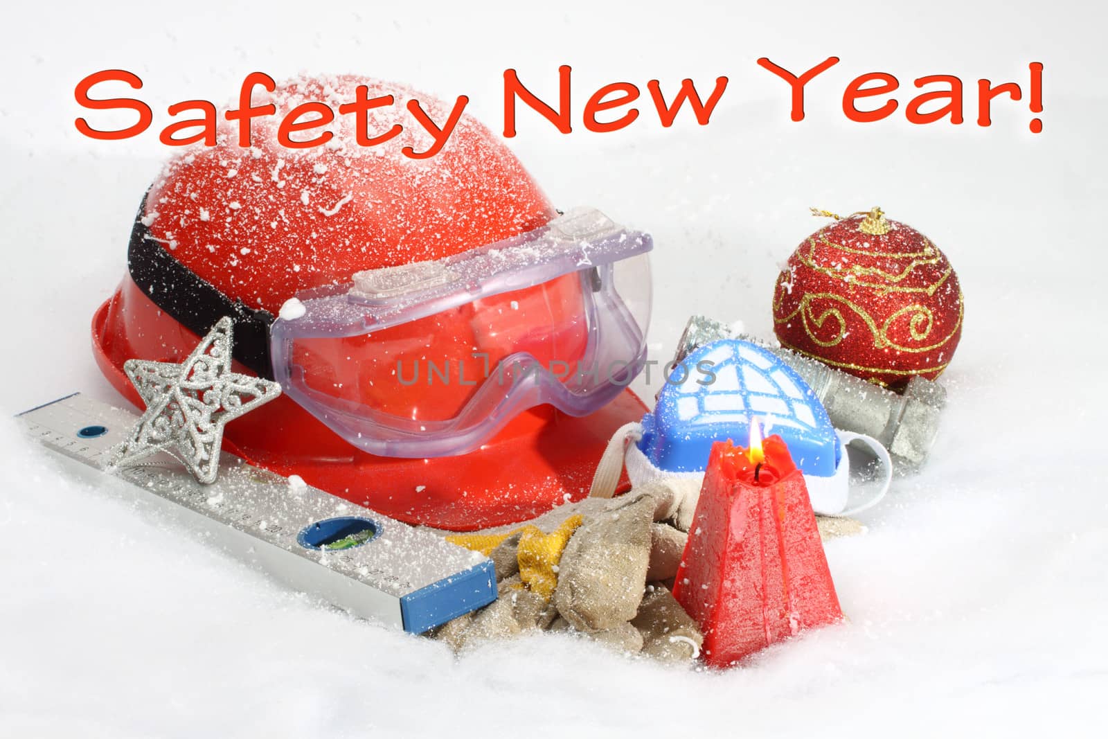 Safety New Year- protective equipment on artificial snow