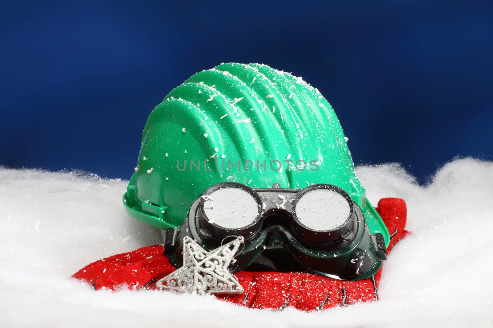 Safety New Year- protective equipment on artificial snow