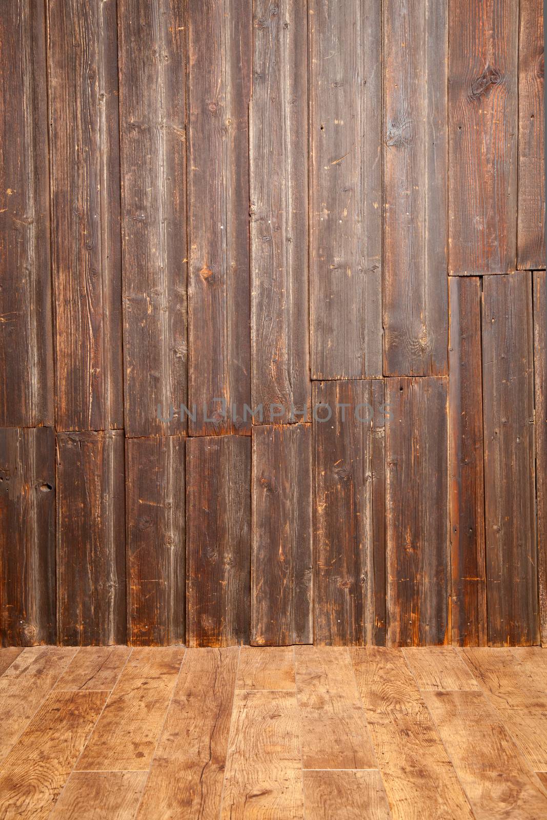 Wall decorated by old wooden planks