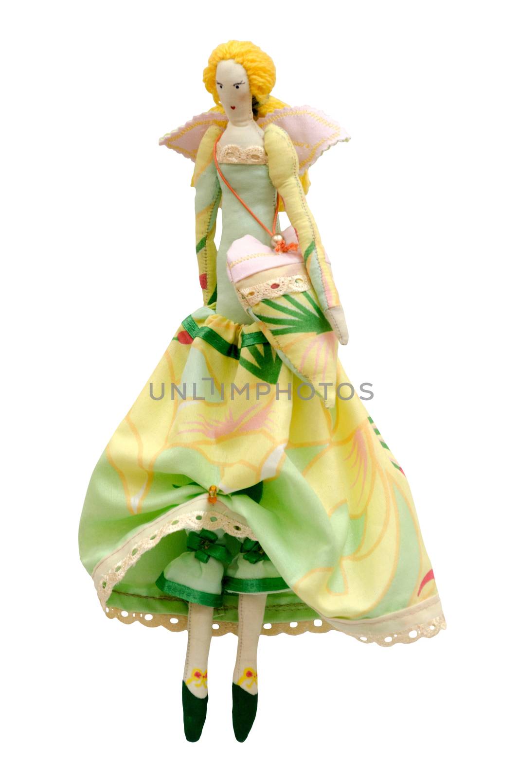The Handmade doll isolated in ball gown with wings and a bag in the shape of heart