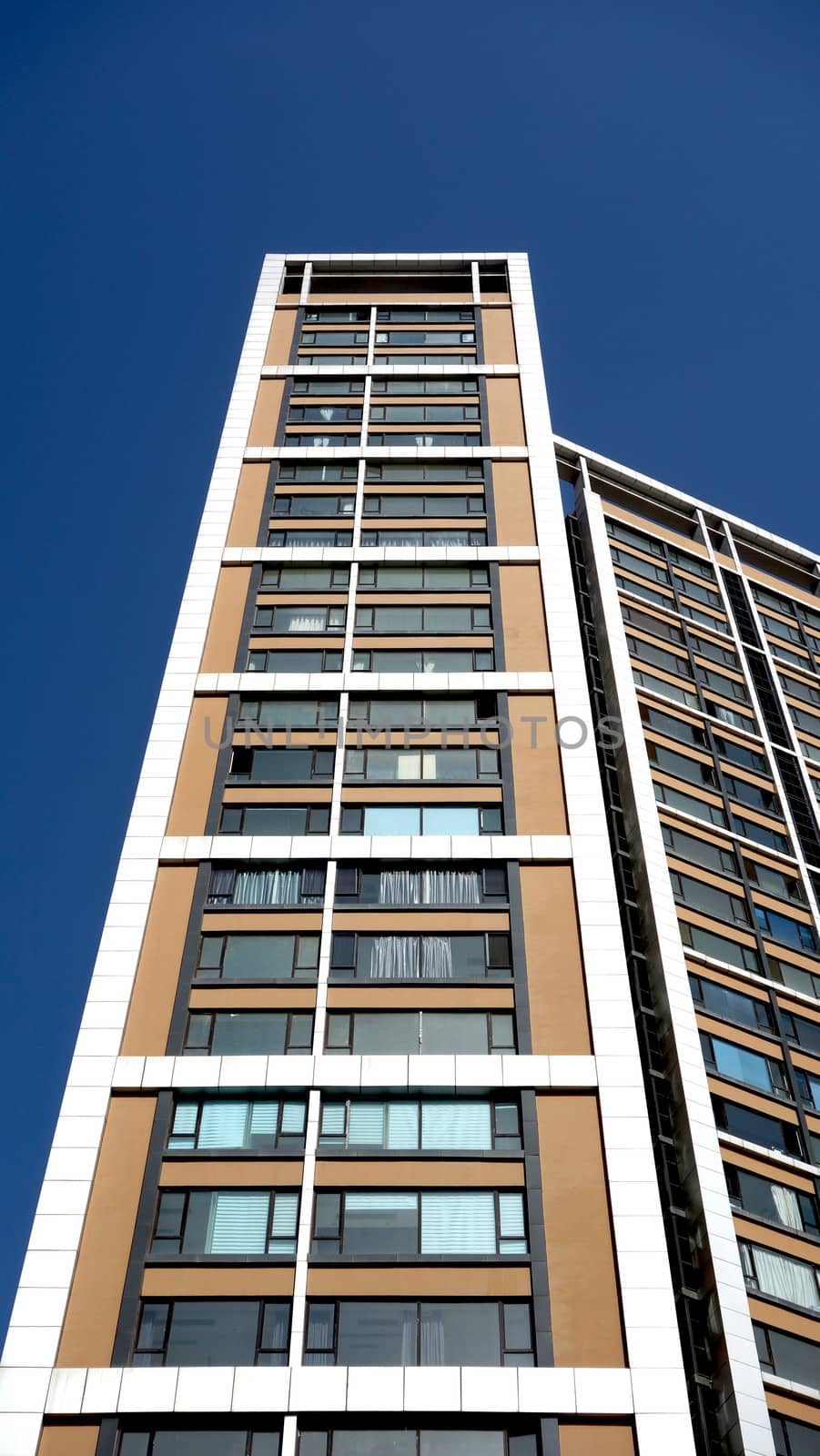 Modern apartment buildings against blue sky in China 