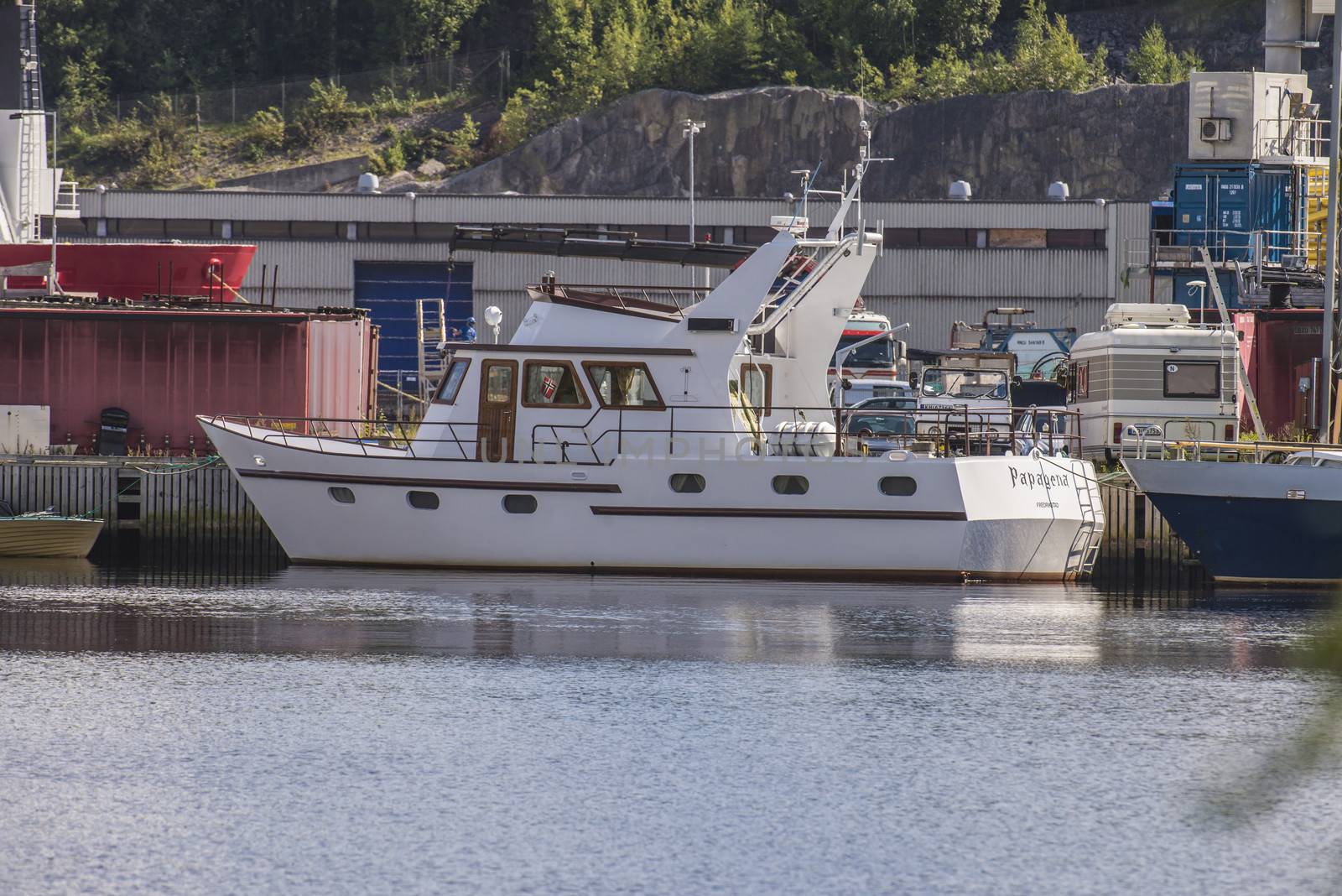 The boat is moored to the dock at the port of Halden, Norway and built of steel
