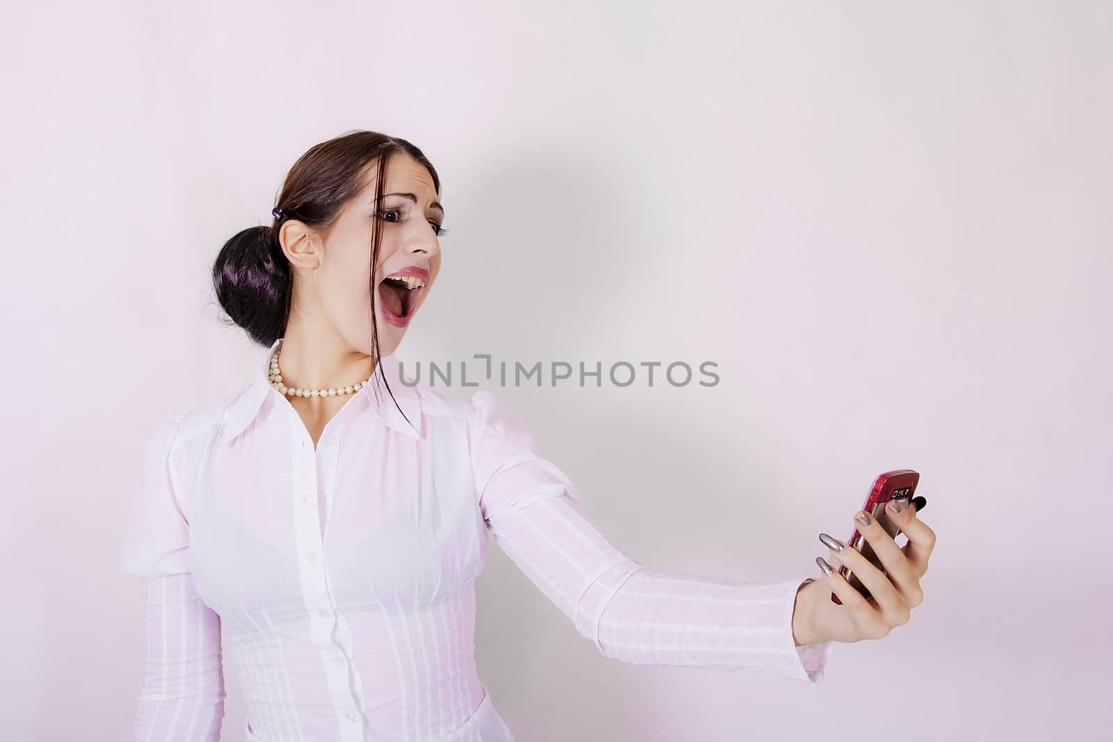 portrit of attractive businesswoman with cell phone