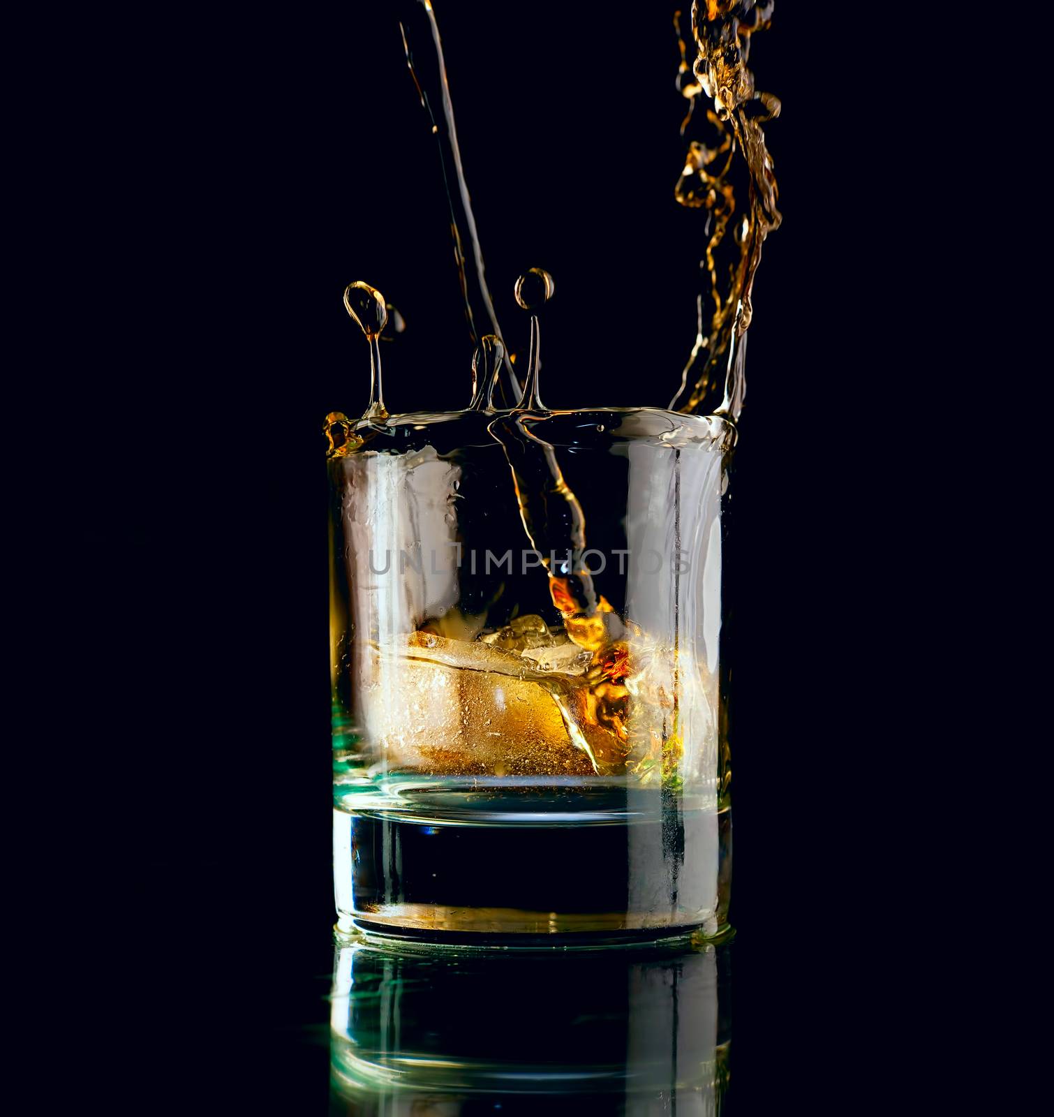 Glass of whiskey on a black background.  by vladimir_sklyarov