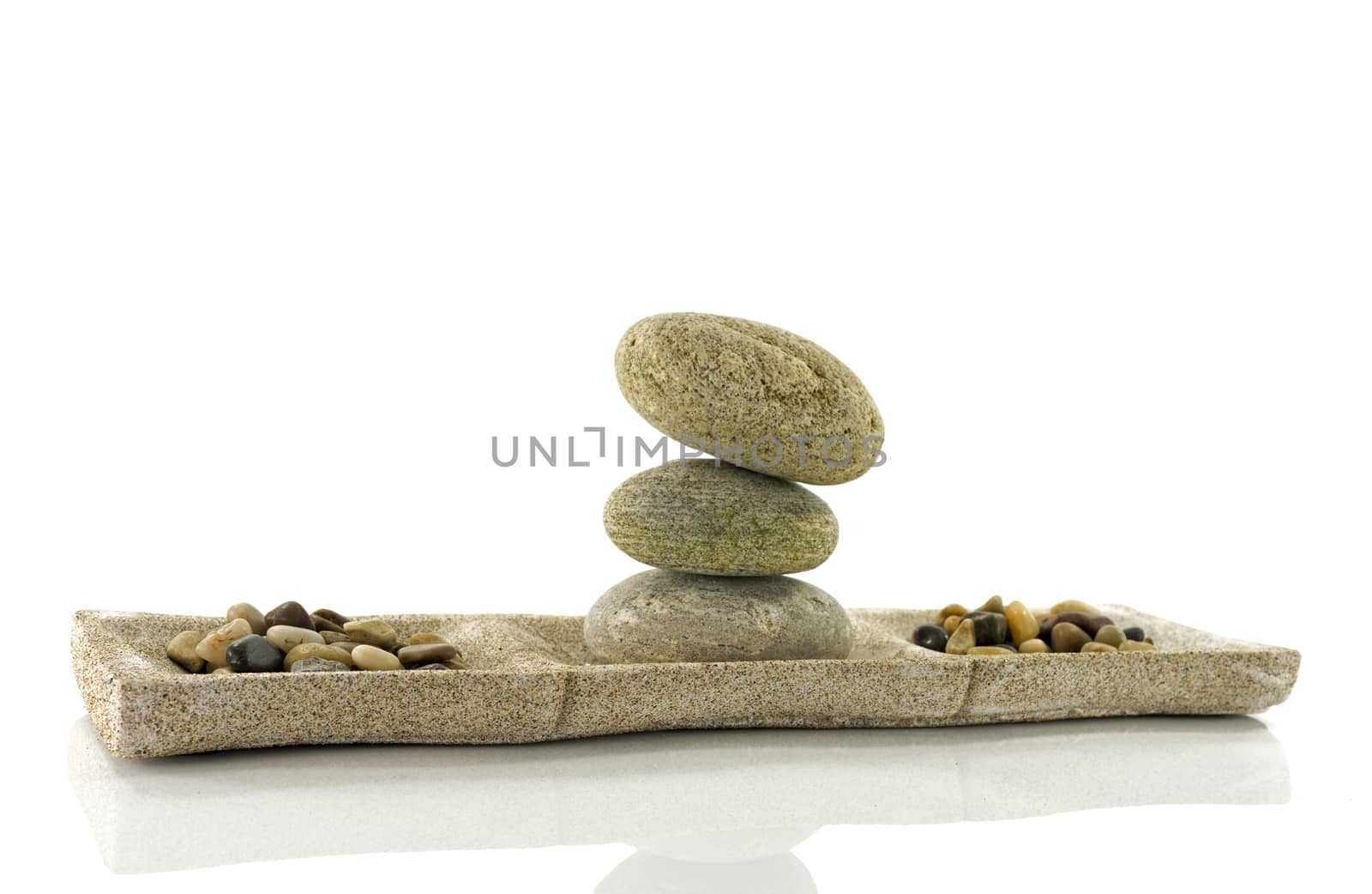 tower stack of stones in perfect balance isolated on white