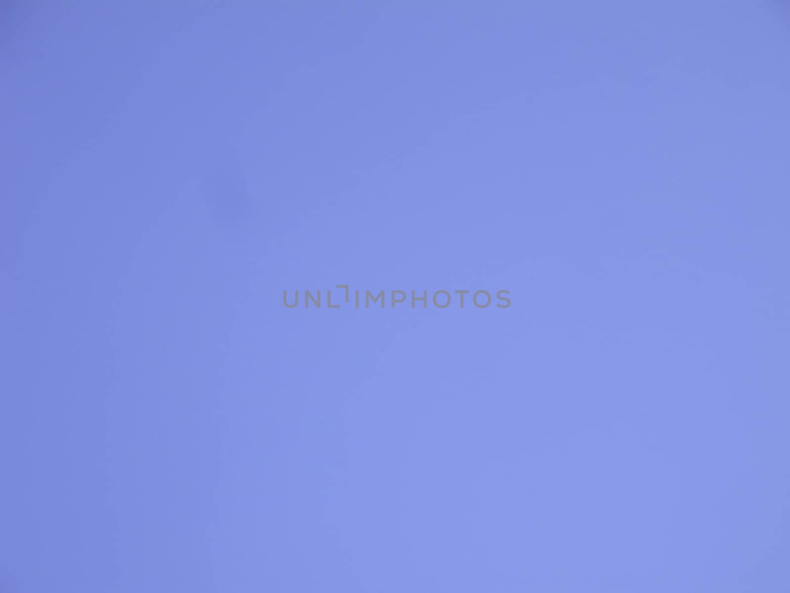 Blue clear sky background with little texture