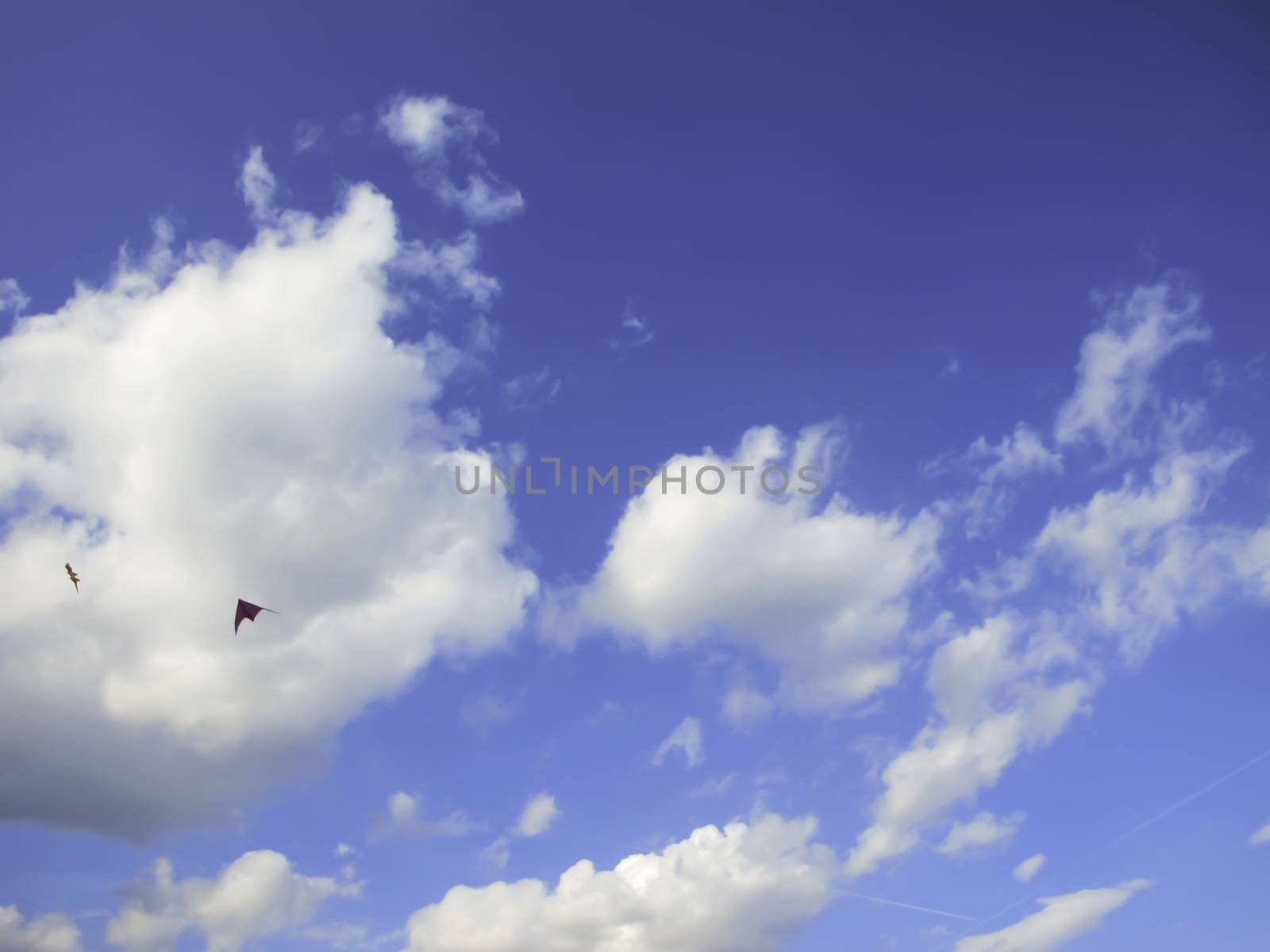 Blue sky with clouds and kites by Arrxxx