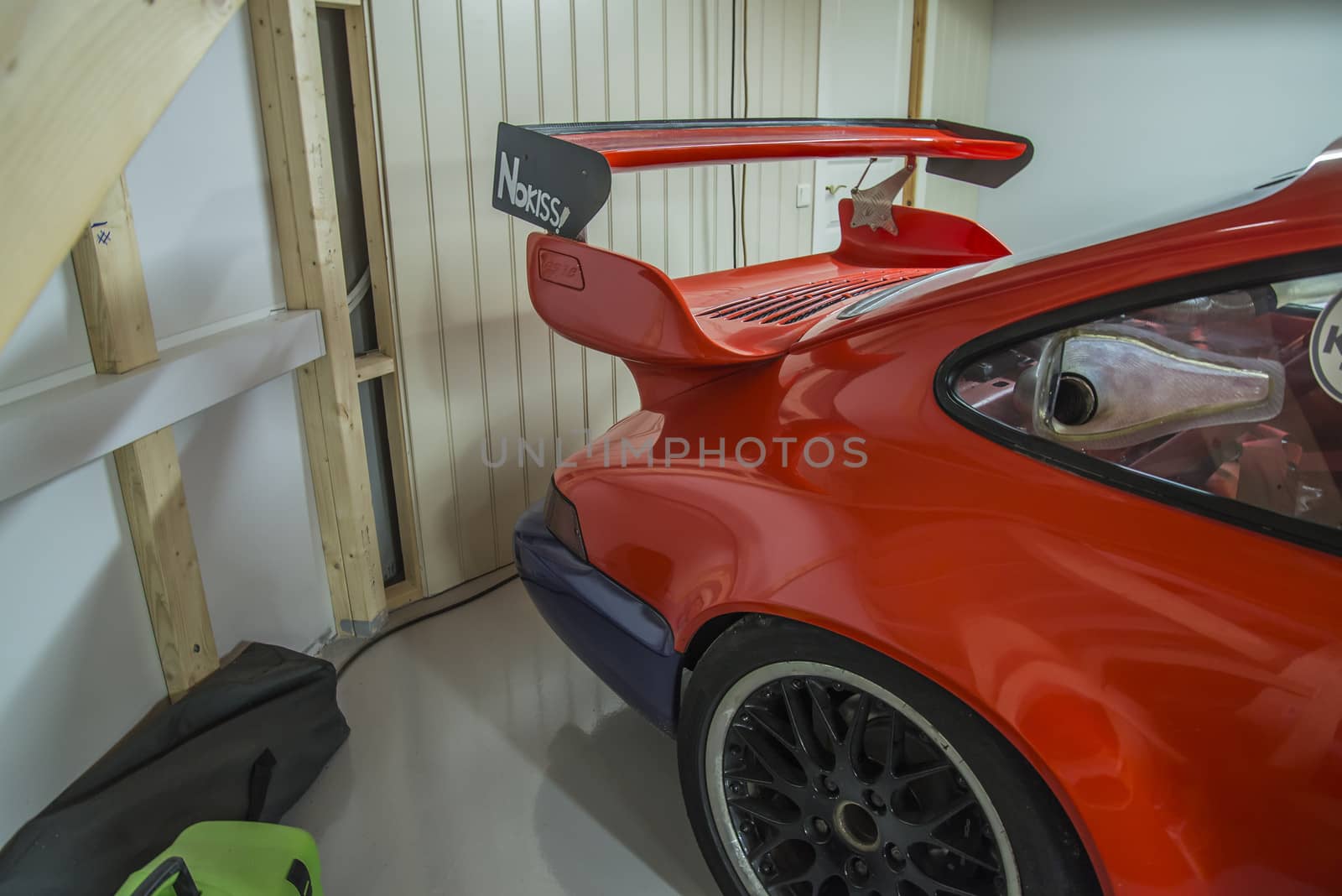 race cars in a garage by steirus