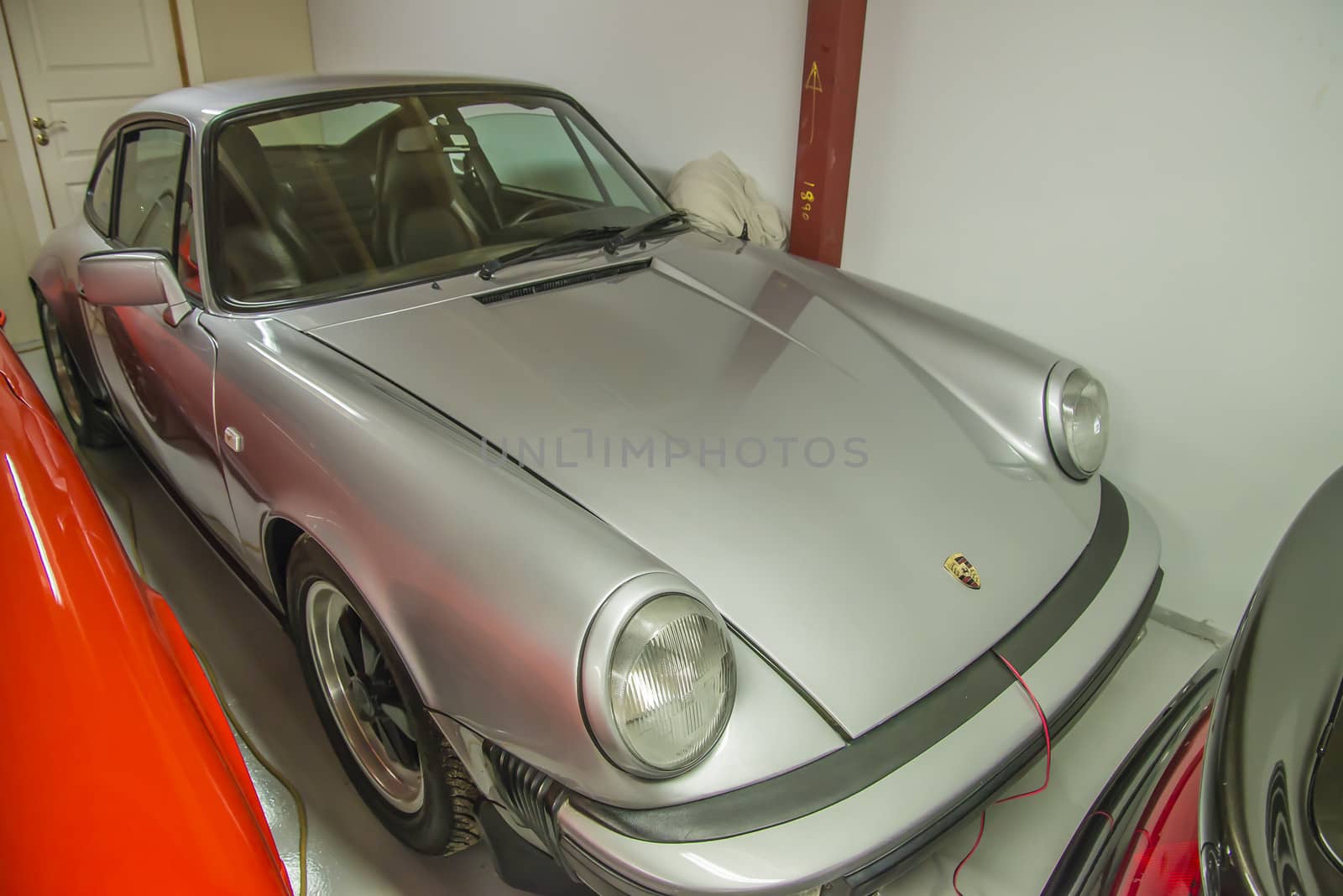 race cars in a garage by steirus