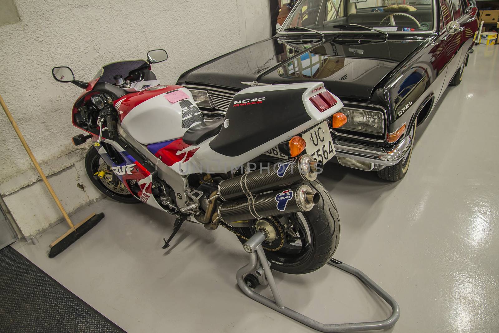 All the photos are shot in a garage in Halden, Norway where race cars and racing motorcycles are maintained and overhauled