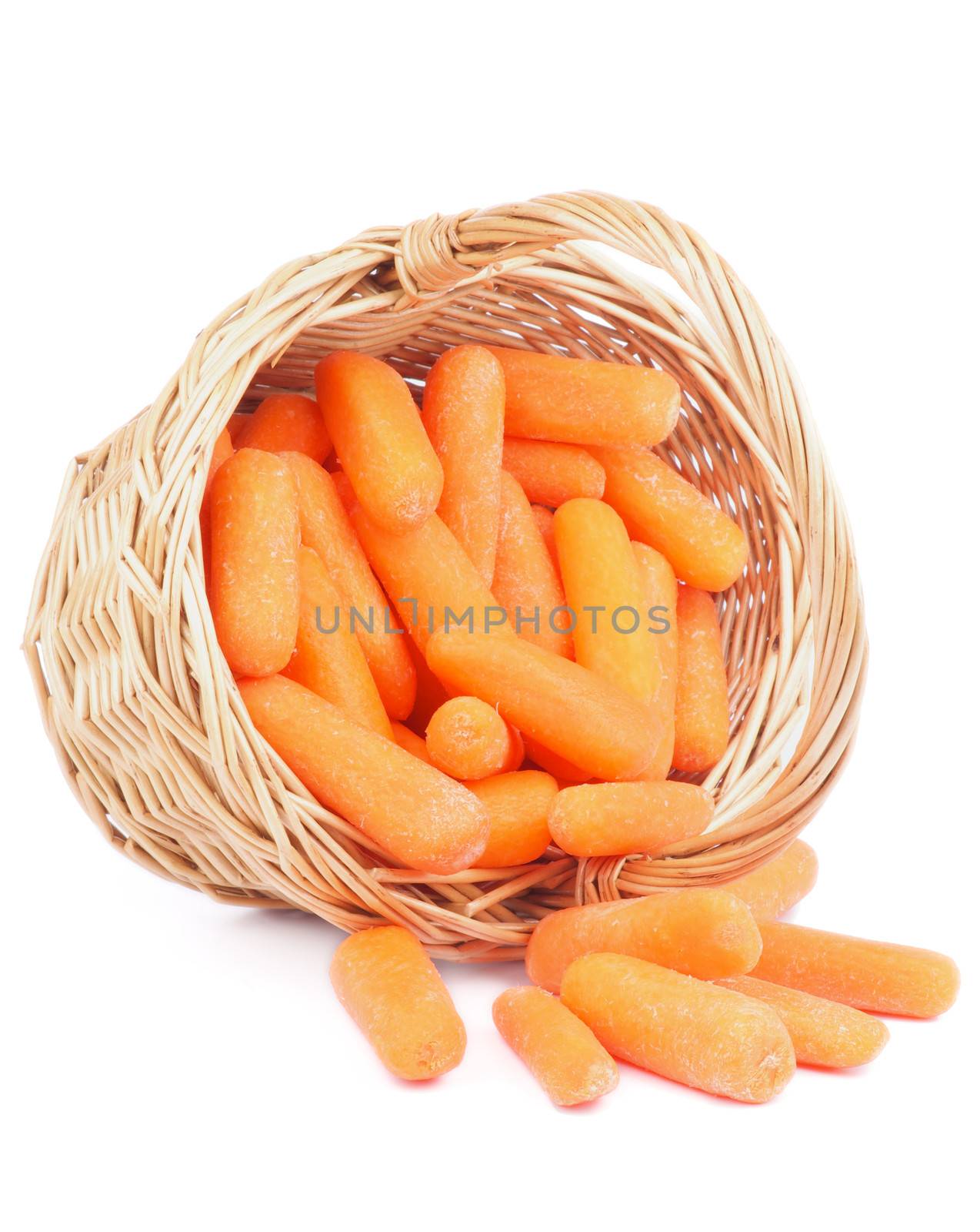 Heap of Fresh Raw Peeled Baby Carrots in Wicker Basket isolated on white background