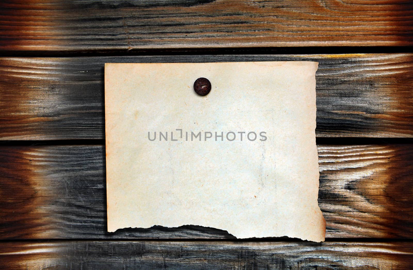 Blank Paper on Wooden Backgrounds by sabphoto