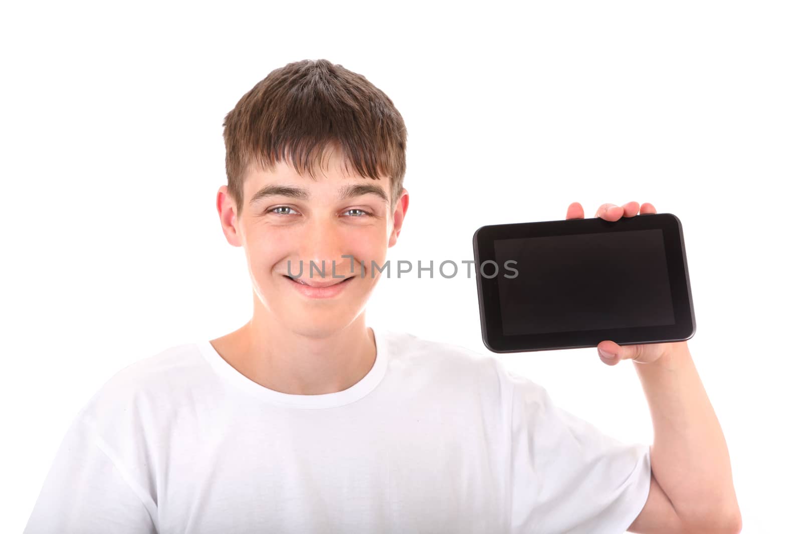 Happy Teenager showing Tablet Computer Isolated on the White Background