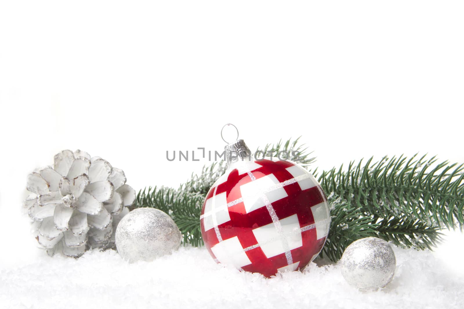 christmas, decoration with fir branch, pine cones, christmas bauble red and silver 