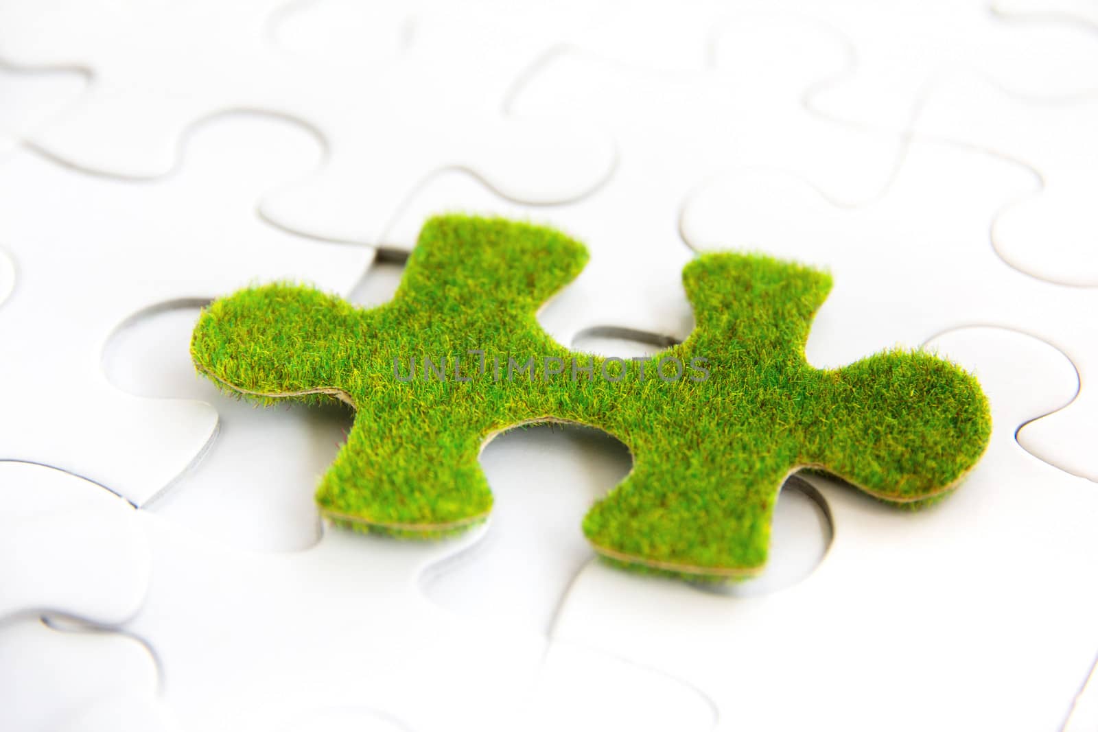 green puzzle piece concept by ponsulak