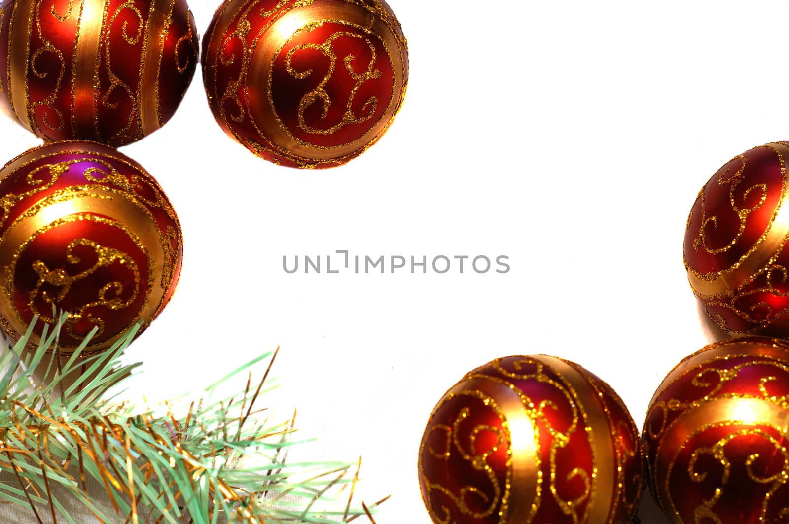 Frame of red Christmas balls and tinsel                      