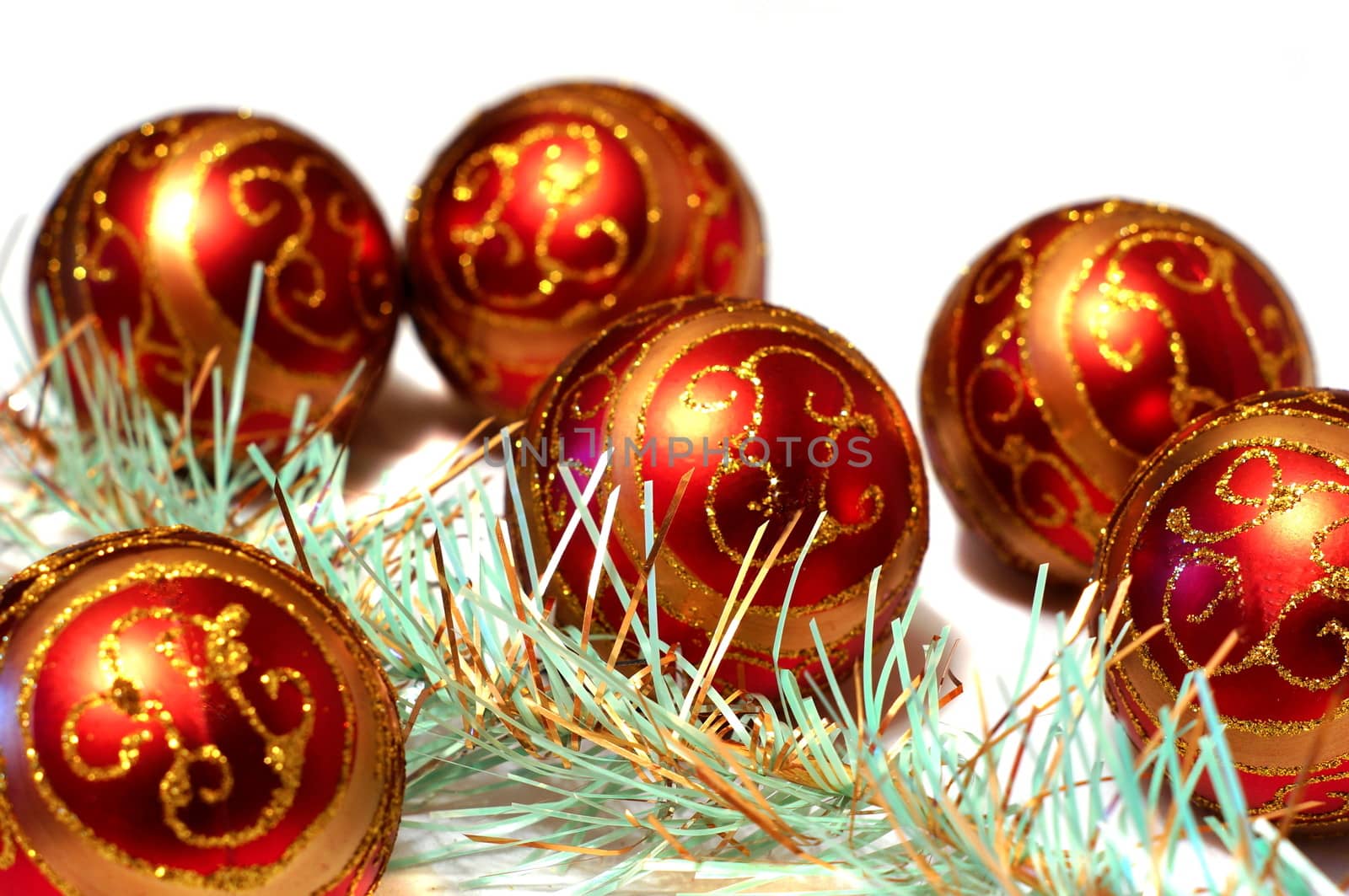 Composition Christmas red balls with gold pattern and tinsel