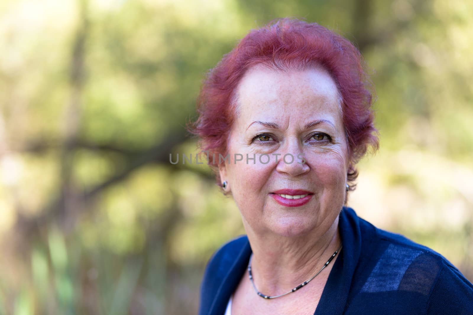 Senior woman giving a genuine, trustful and determined look