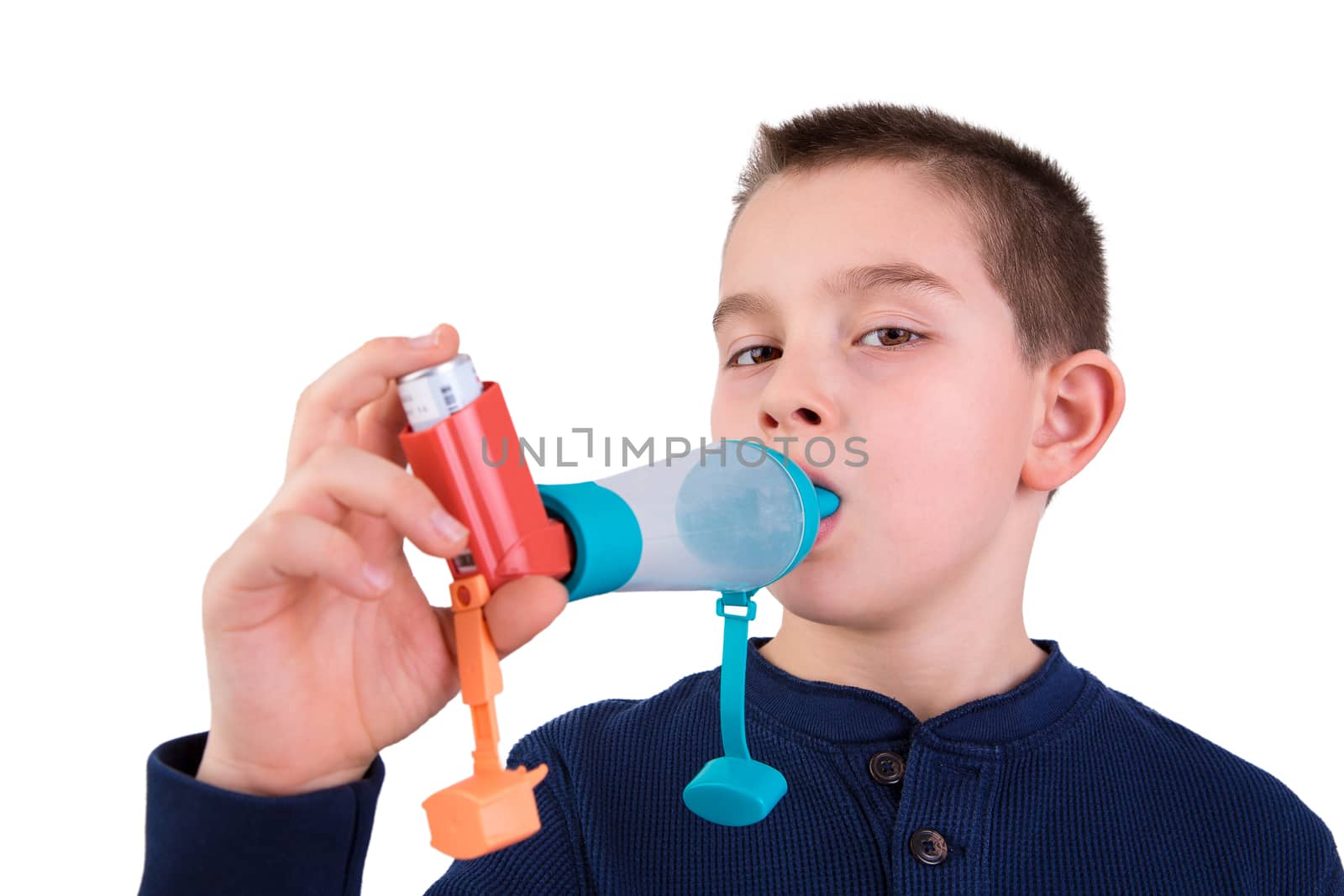 Kid using Inhaler with Spacer by coskun