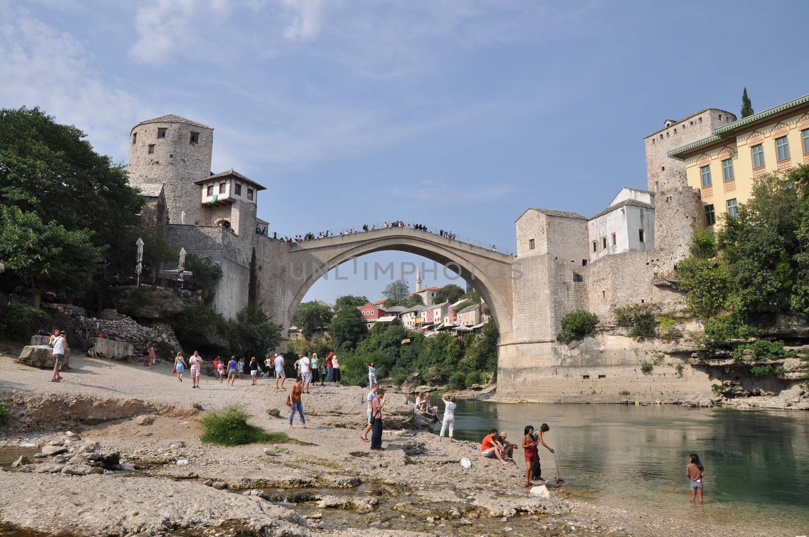 MOSTAR, BOSNIA-HERCEGOVINA AUGUST 10: Tourist at the old bridge  by anderm