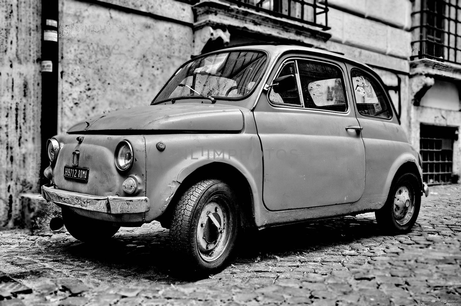 ROME - SEPTEMBER 20: A Fiat 500 on September 20, 2013 in Rome. F by anderm