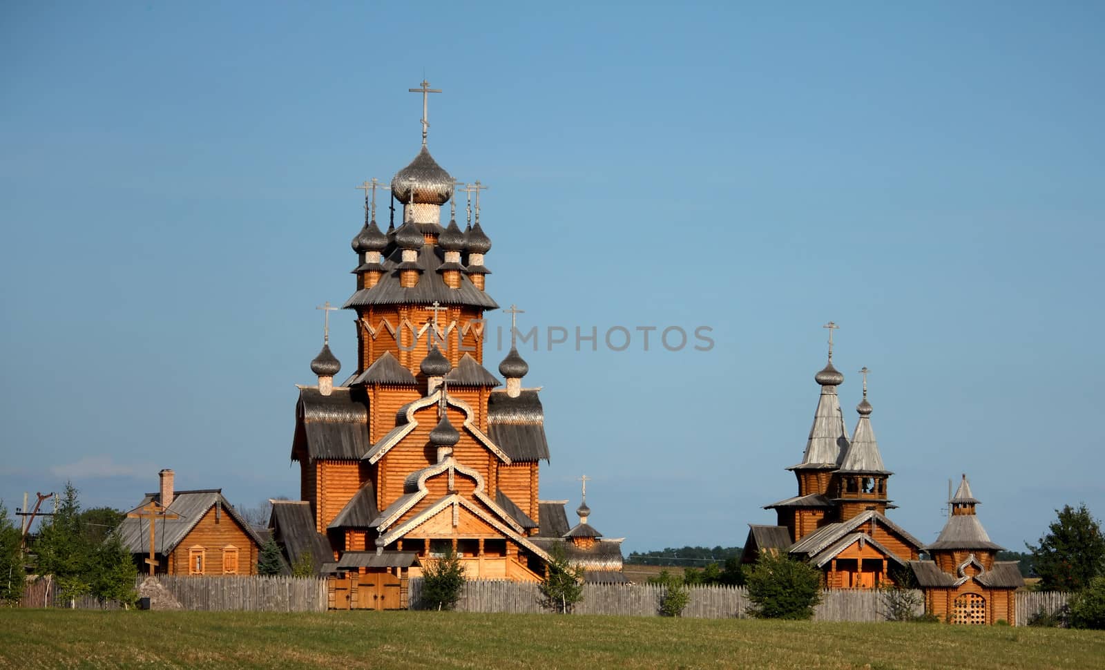 Village with traditional wooden houses and church