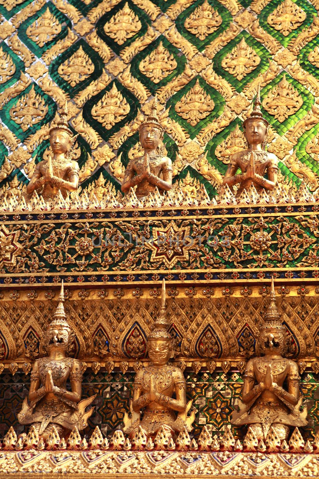 closeup the golden Buddhist temple gable in Thailand