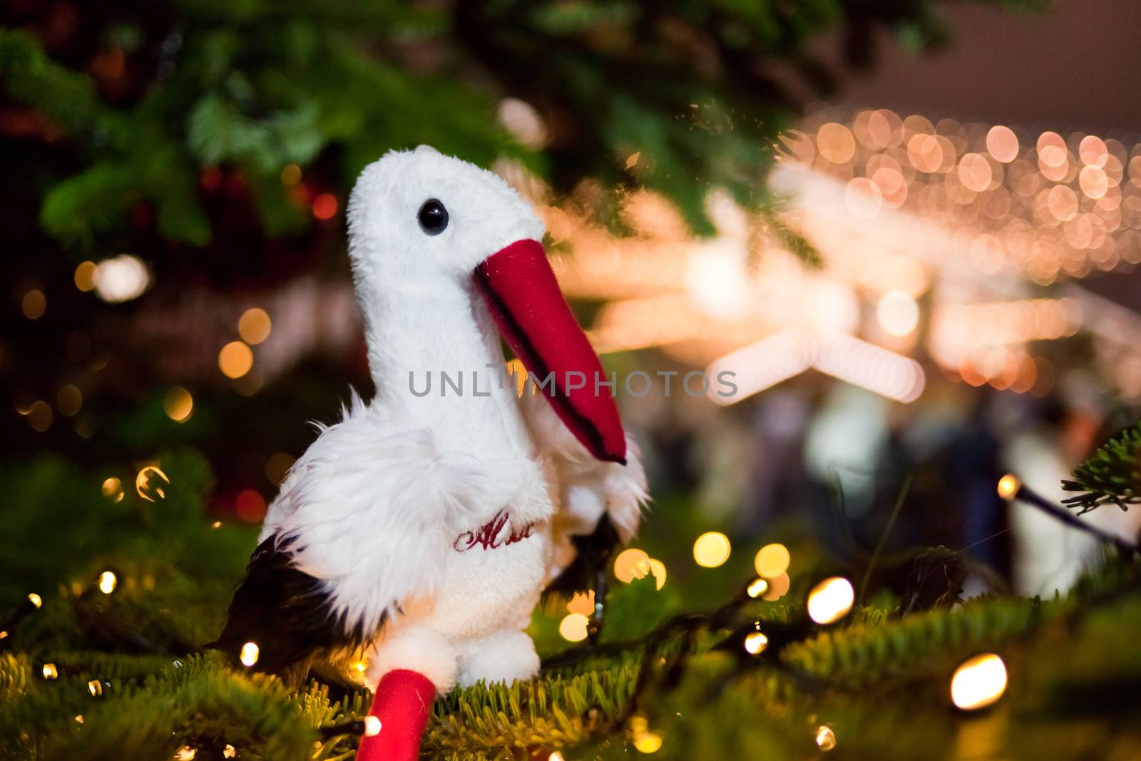 Post card with white stork on a new year tree by vicdemid