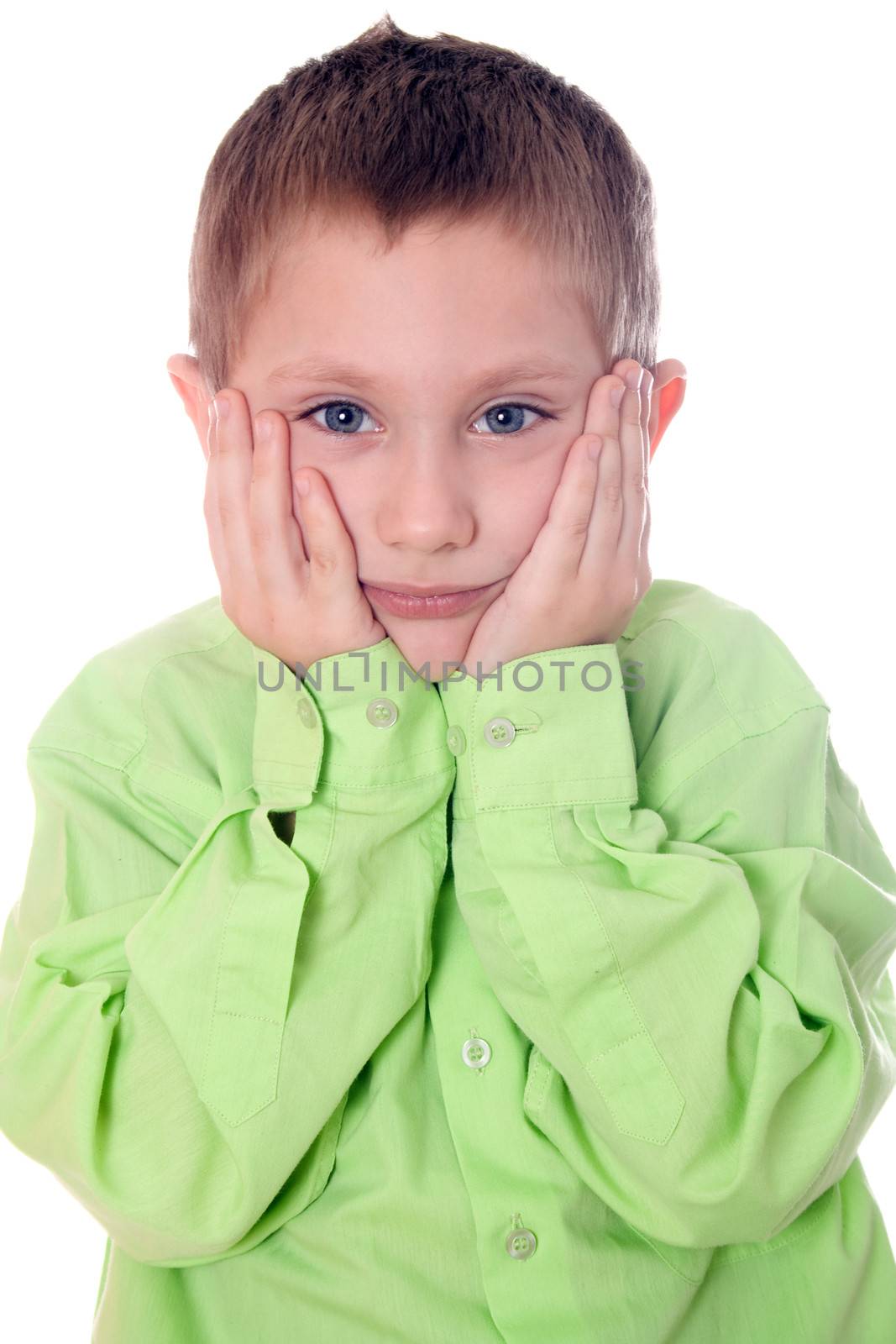 Portrait of sad crying little boy covers his face with hands