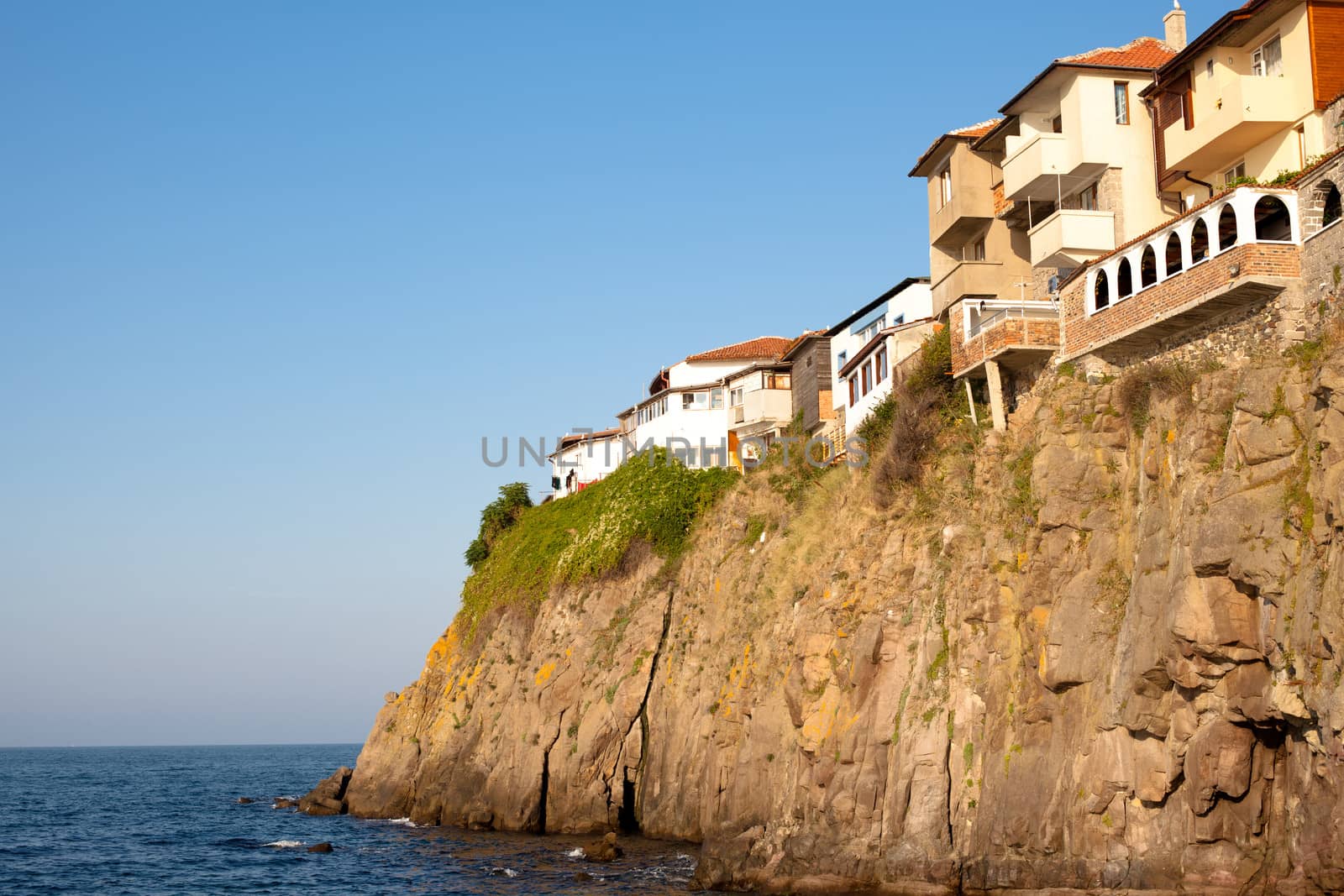 Houses on the cliff above the sea in Sozopol in Bulgaria

