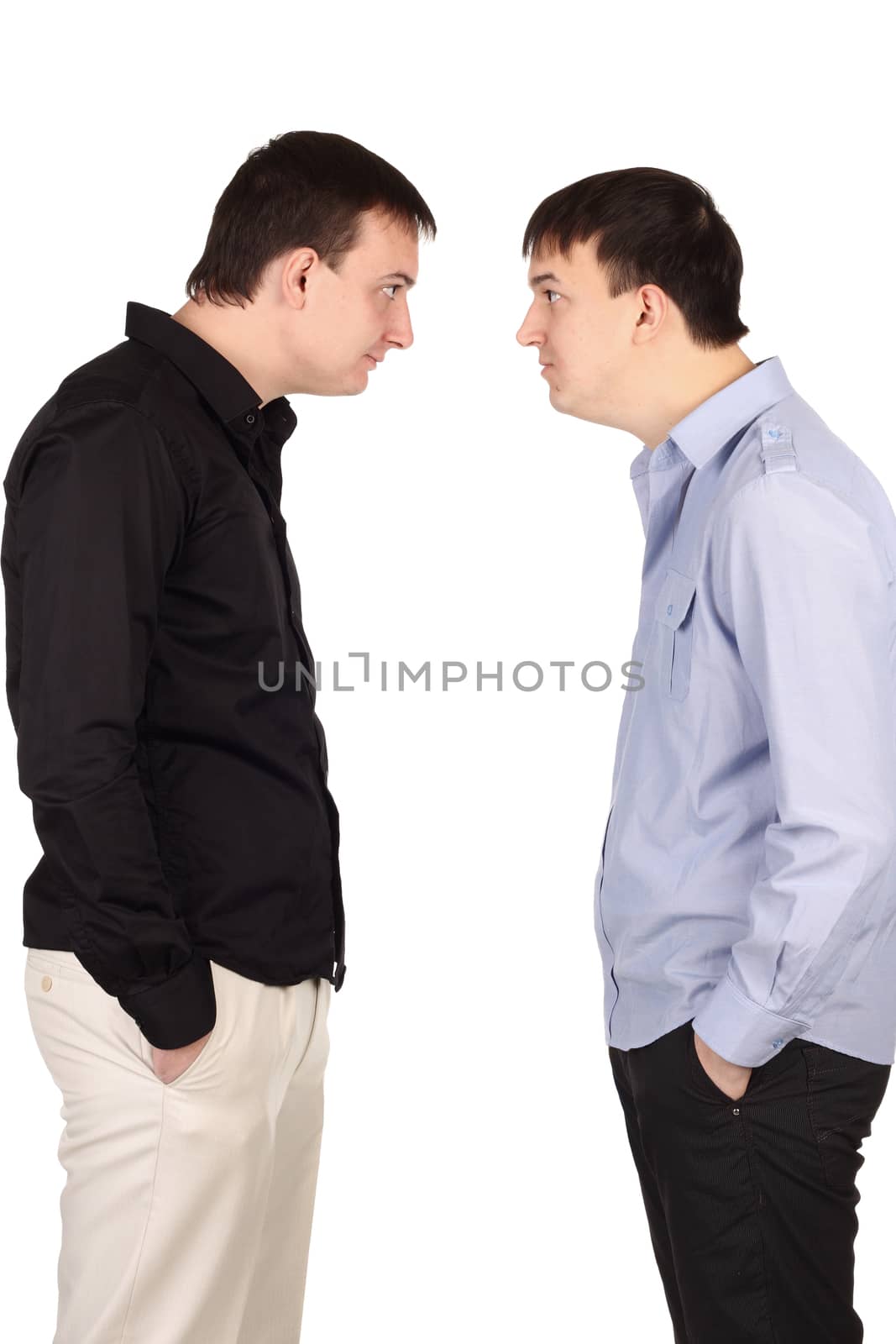 Two guys looking at each other at white background