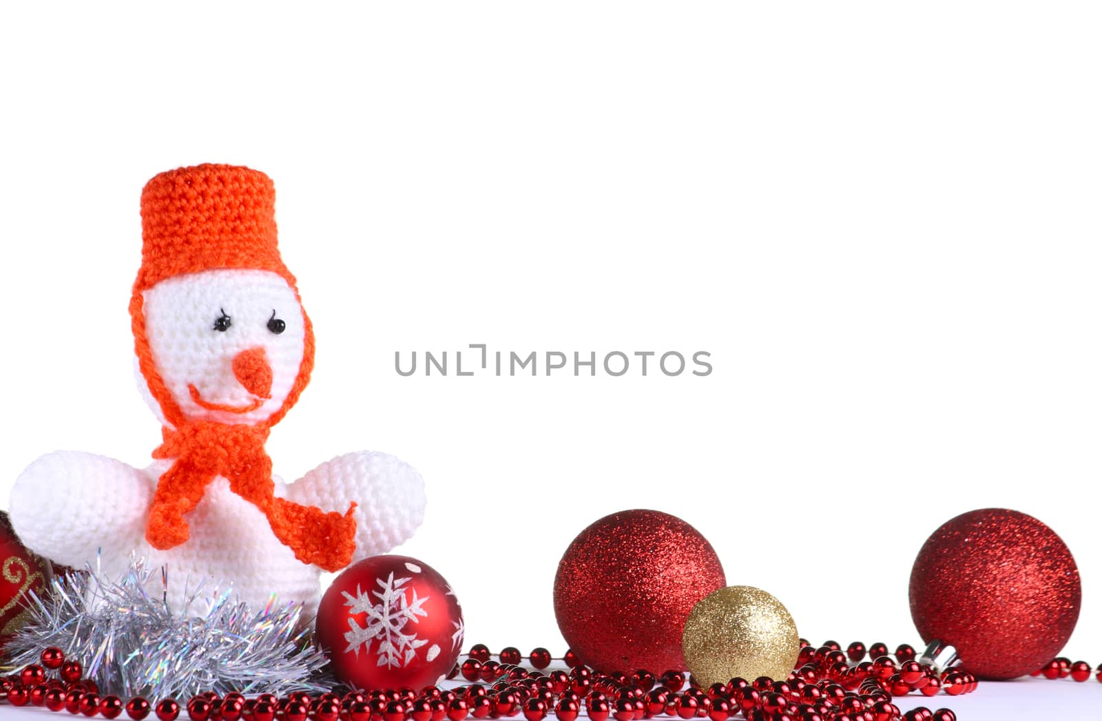 White snowman made from threads at the white background
